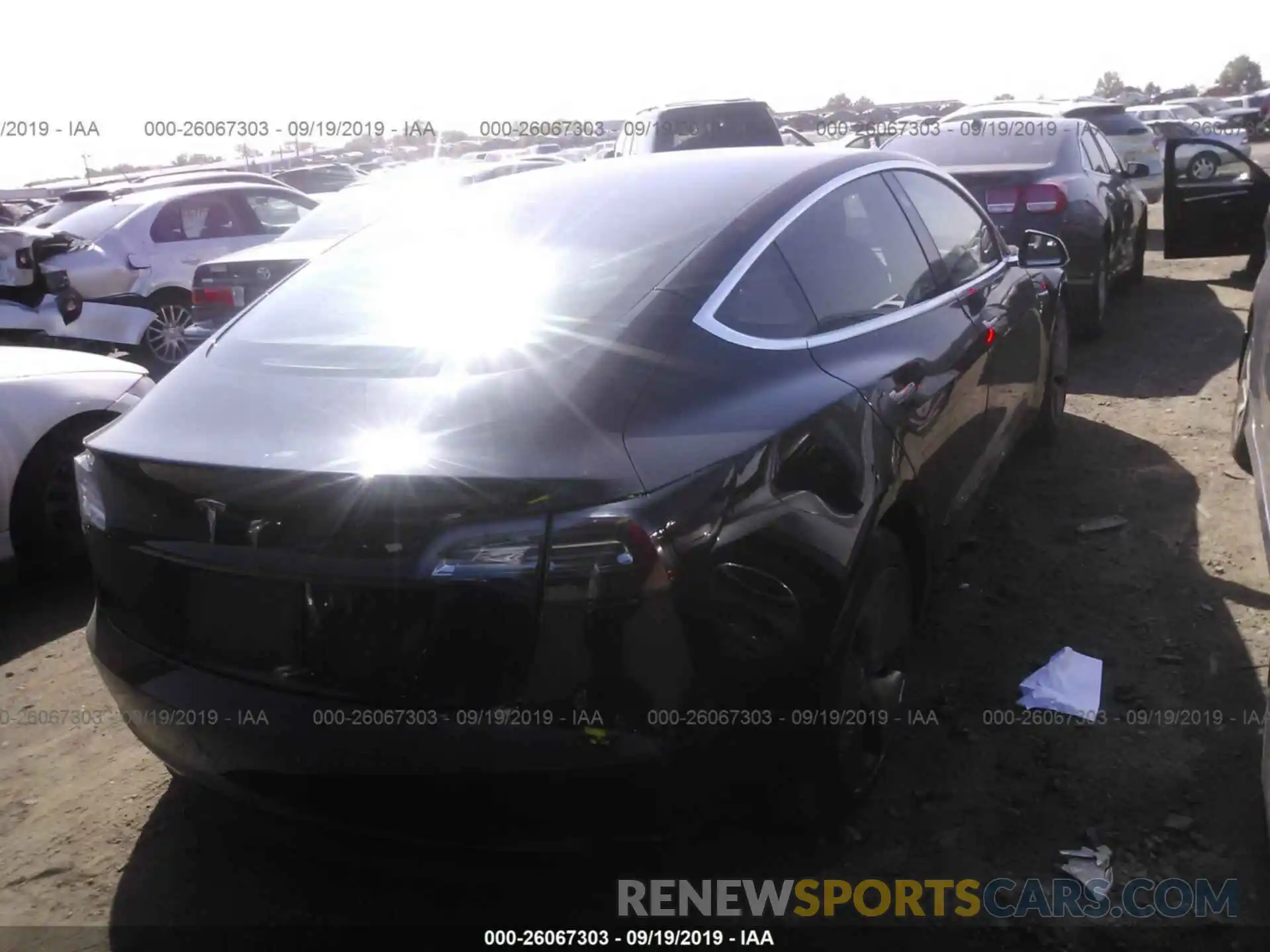 4 Photograph of a damaged car 5YJ3E1EA5KF399000 TESLA MODEL 3 2019