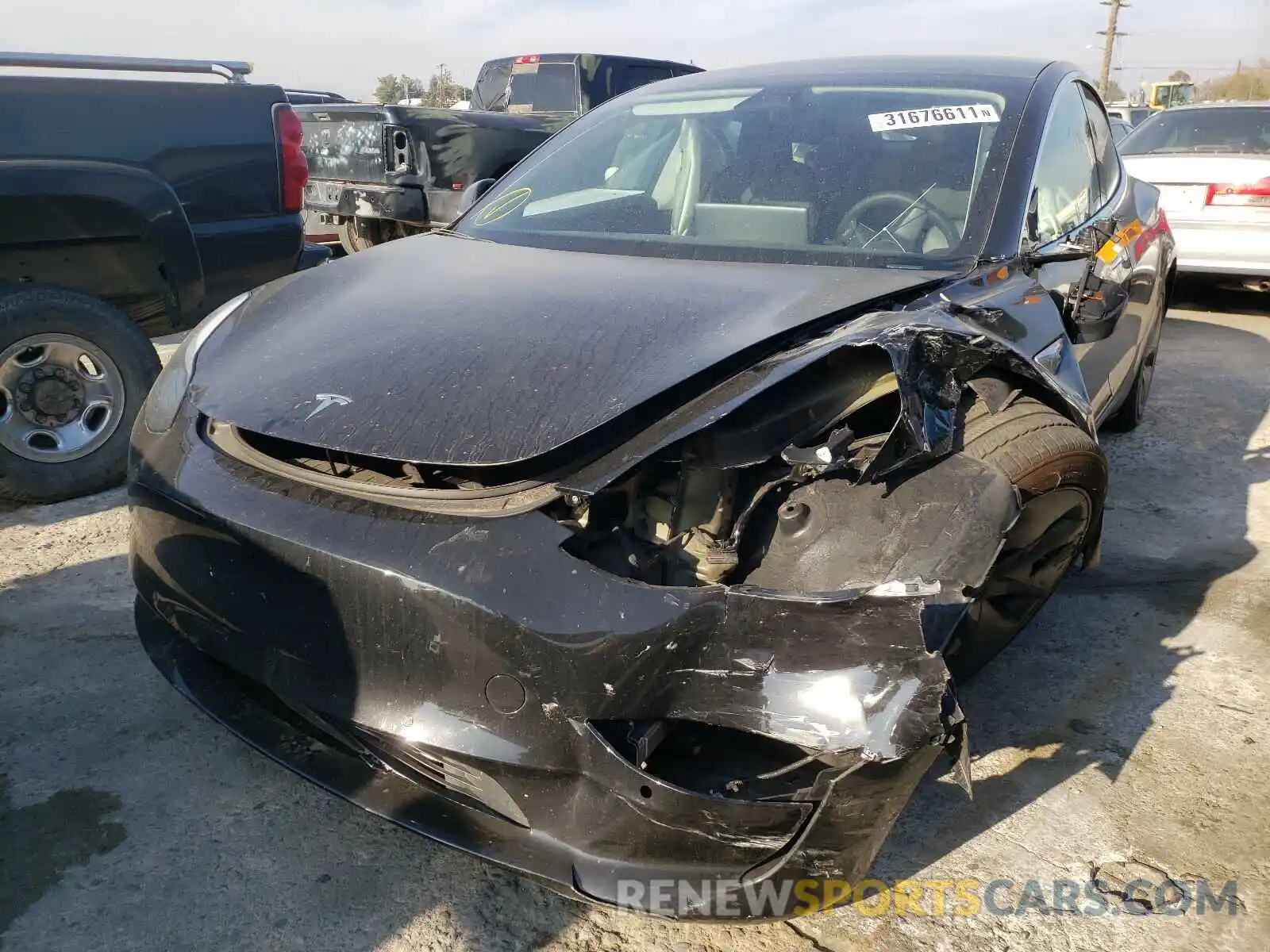 2 Photograph of a damaged car 5YJ3E1EA5KF410304 TESLA MODEL 3 2019