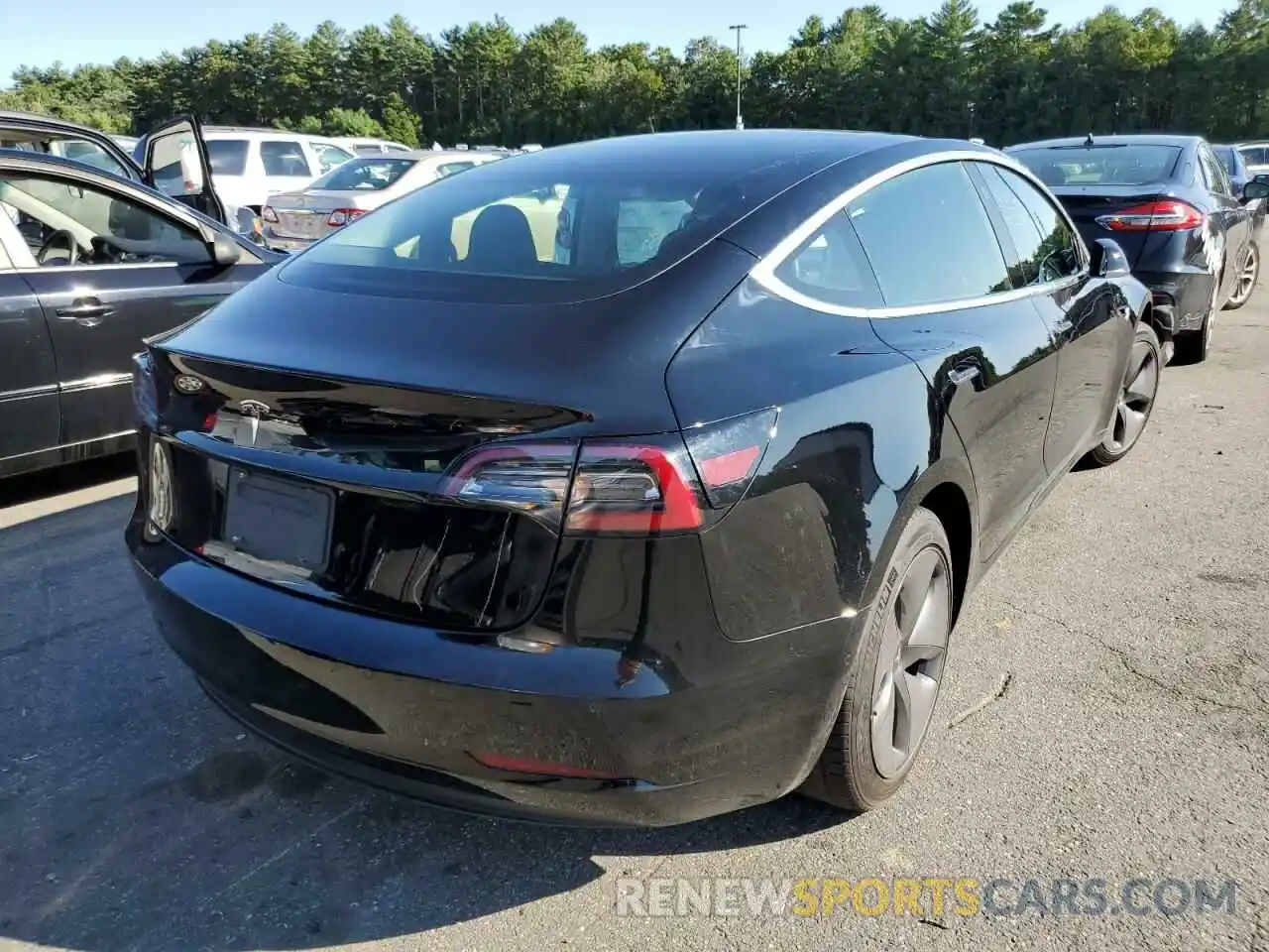 4 Photograph of a damaged car 5YJ3E1EA6KF296796 TESLA MODEL 3 2019