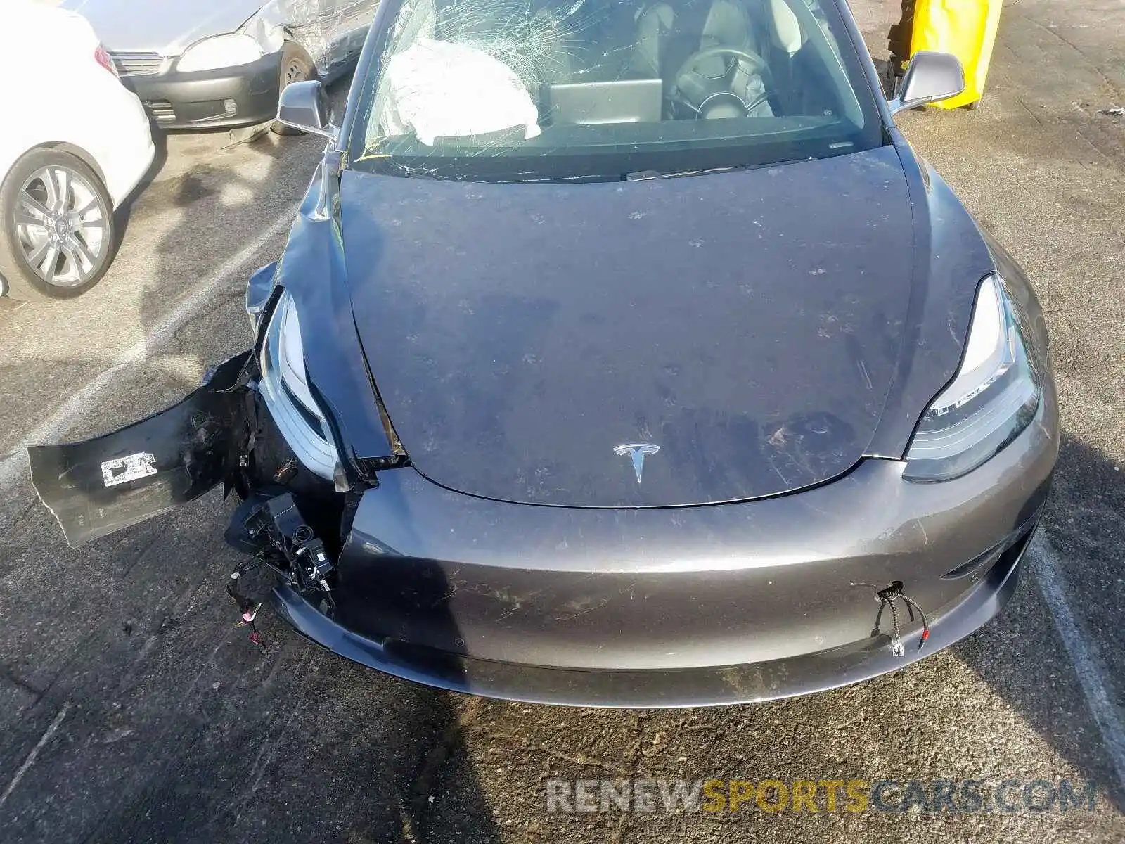 7 Photograph of a damaged car 5YJ3E1EA6KF308249 TESLA MODEL 3 2019