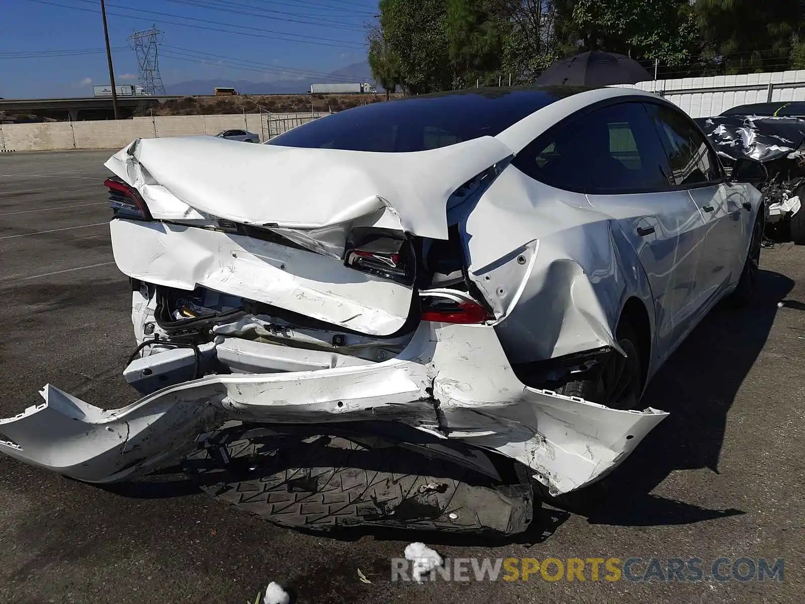 4 Photograph of a damaged car 5YJ3E1EA6KF311703 TESLA MODEL 3 2019