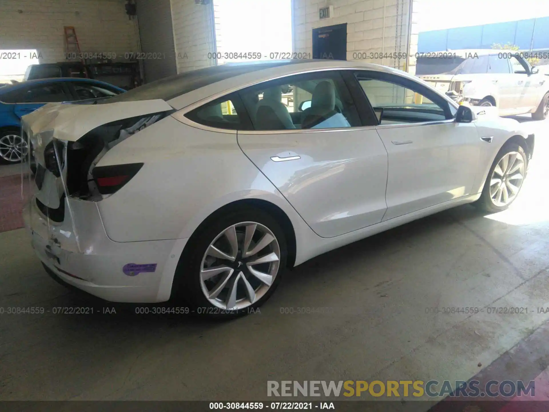 4 Photograph of a damaged car 5YJ3E1EA6KF417925 TESLA MODEL 3 2019