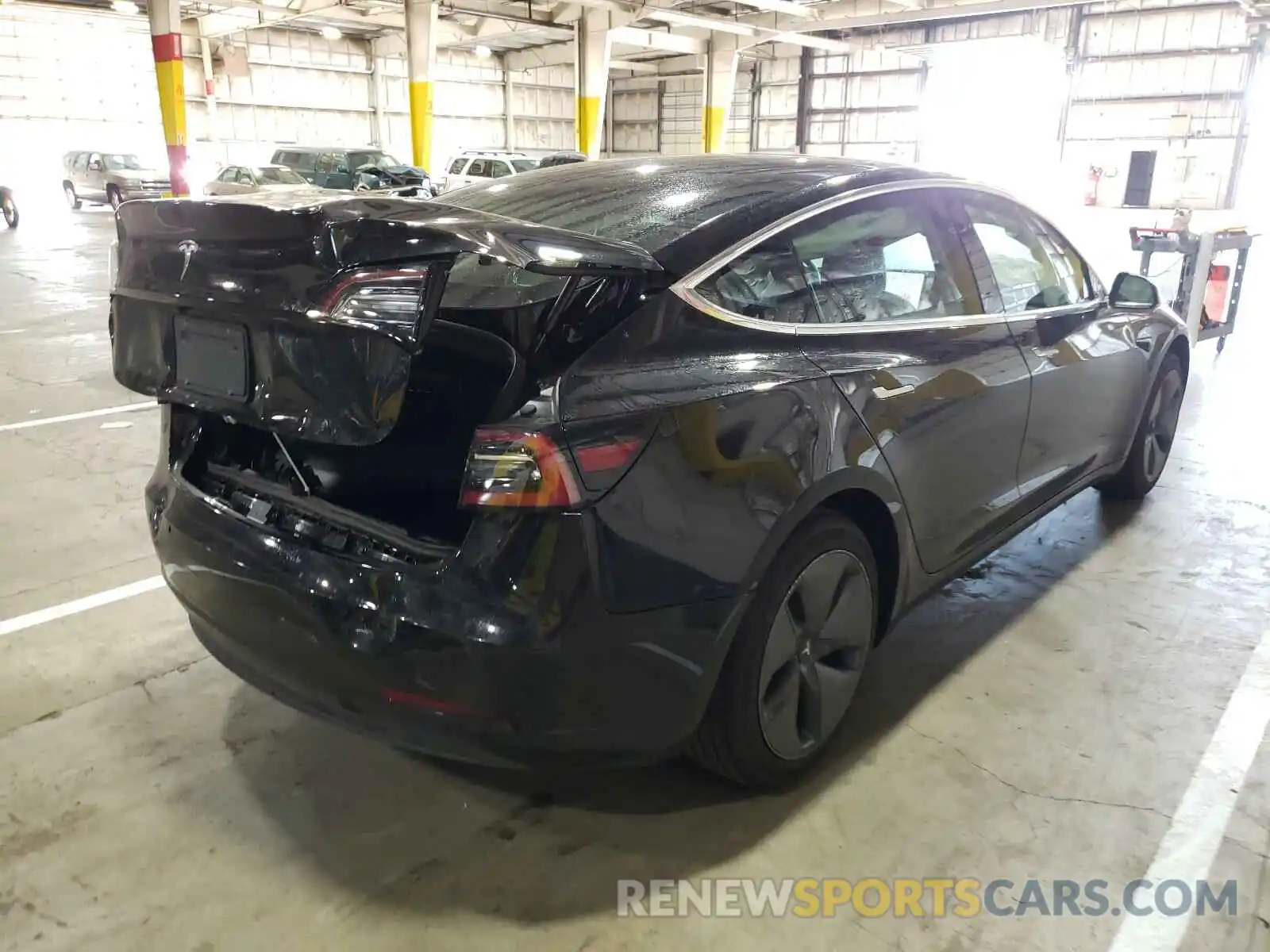 4 Photograph of a damaged car 5YJ3E1EA7KF394722 TESLA MODEL 3 2019