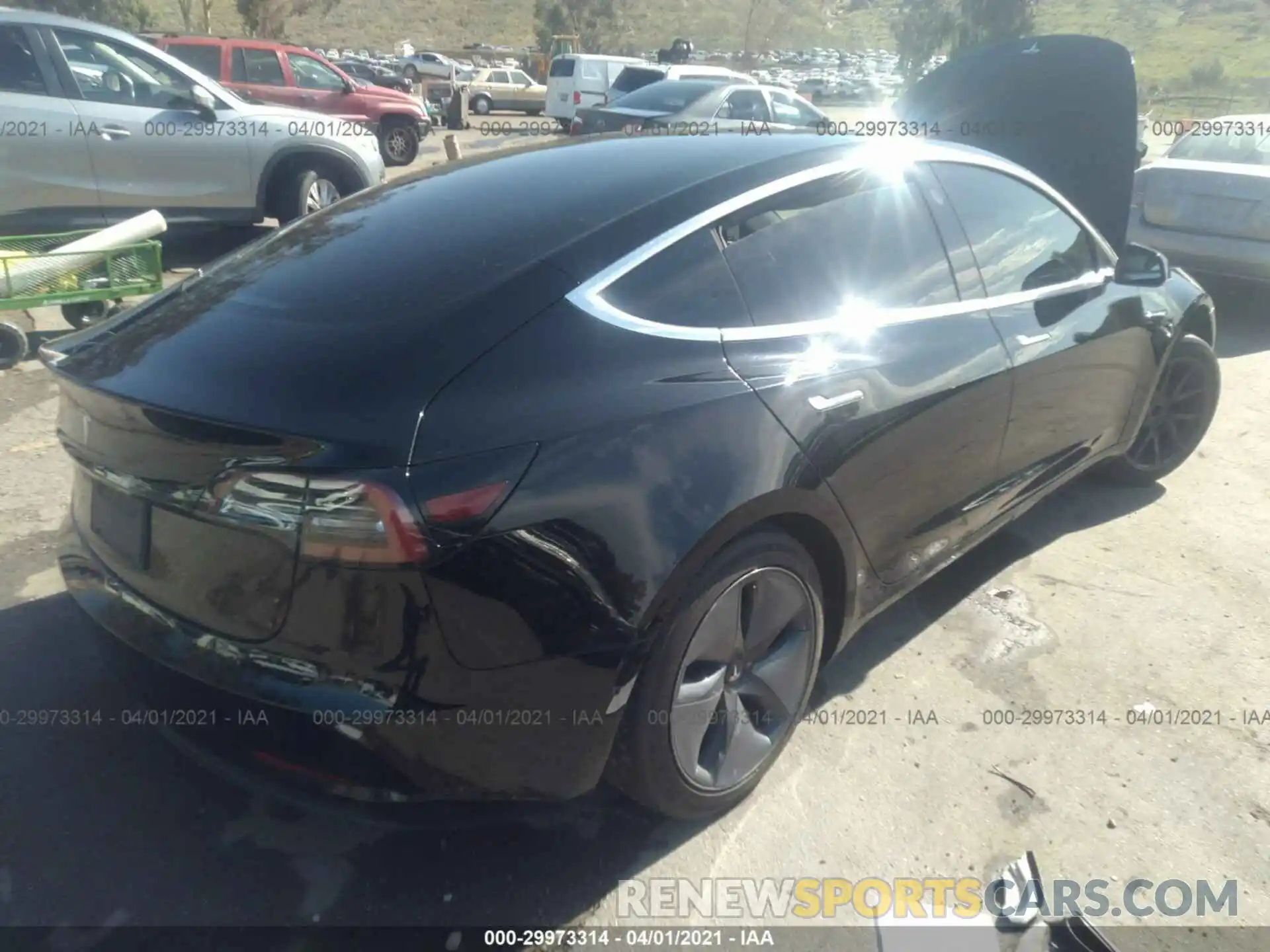 4 Photograph of a damaged car 5YJ3E1EA7KF402964 TESLA MODEL 3 2019