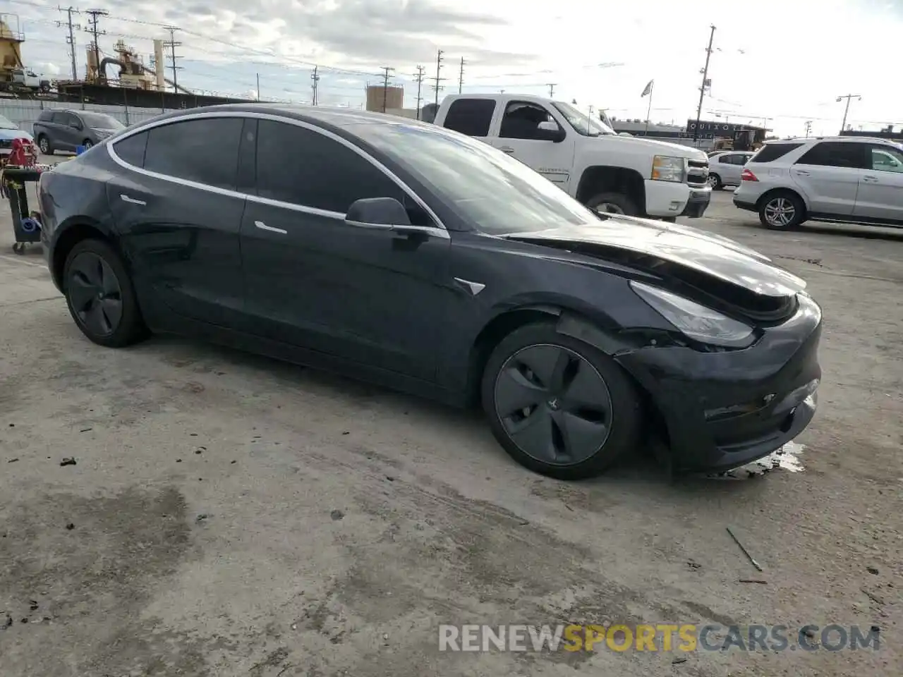 4 Фотография поврежденного автомобиля 5YJ3E1EA7KF409753 TESLA MODEL 3 2019