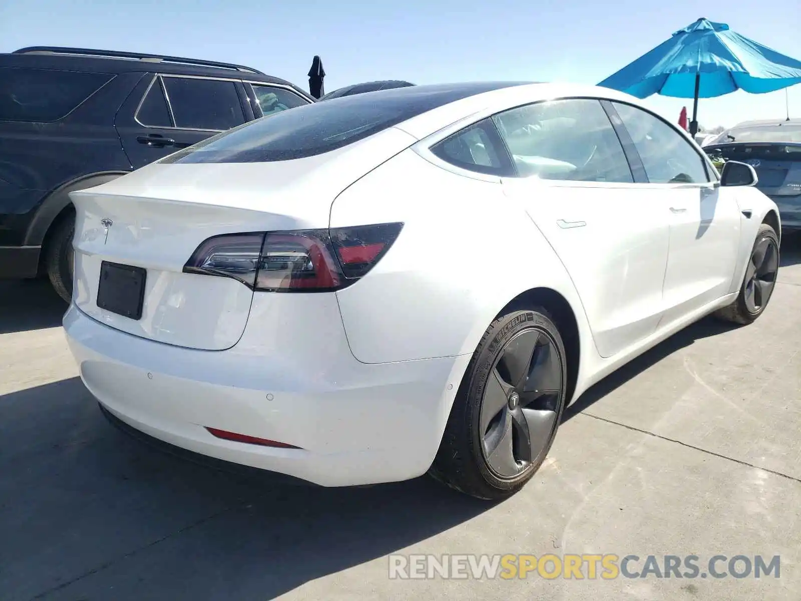 4 Photograph of a damaged car 5YJ3E1EA7KF415830 TESLA MODEL 3 2019