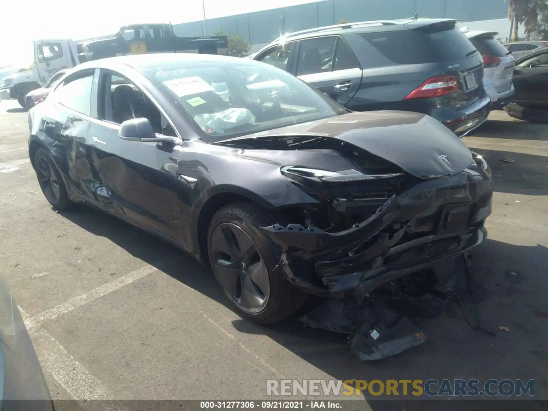 1 Photograph of a damaged car 5YJ3E1EA7KF424723 TESLA MODEL 3 2019