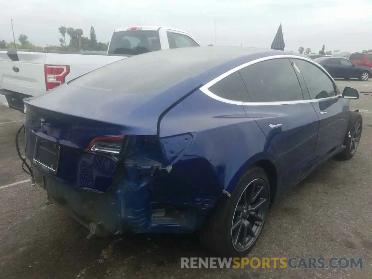 4 Photograph of a damaged car 5YJ3E1EA7KF476157 TESLA MODEL 3 2019