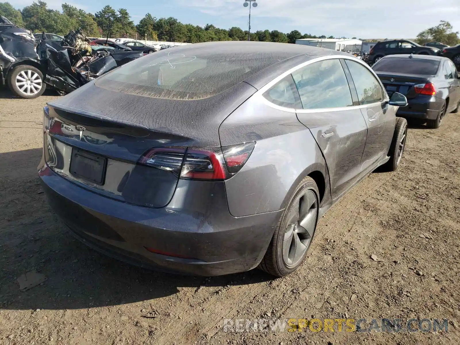 4 Photograph of a damaged car 5YJ3E1EA8KF308172 TESLA MODEL 3 2019