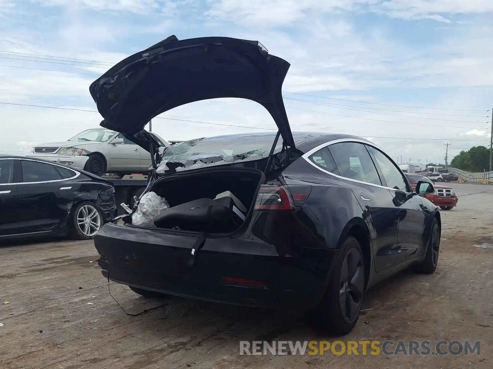 4 Photograph of a damaged car 5YJ3E1EA8KF317017 TESLA MODEL 3 2019