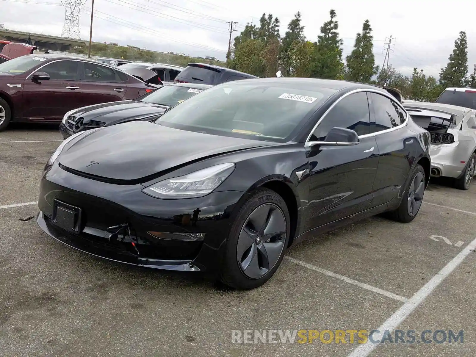 2 Photograph of a damaged car 5YJ3E1EA8KF399704 TESLA MODEL 3 2019