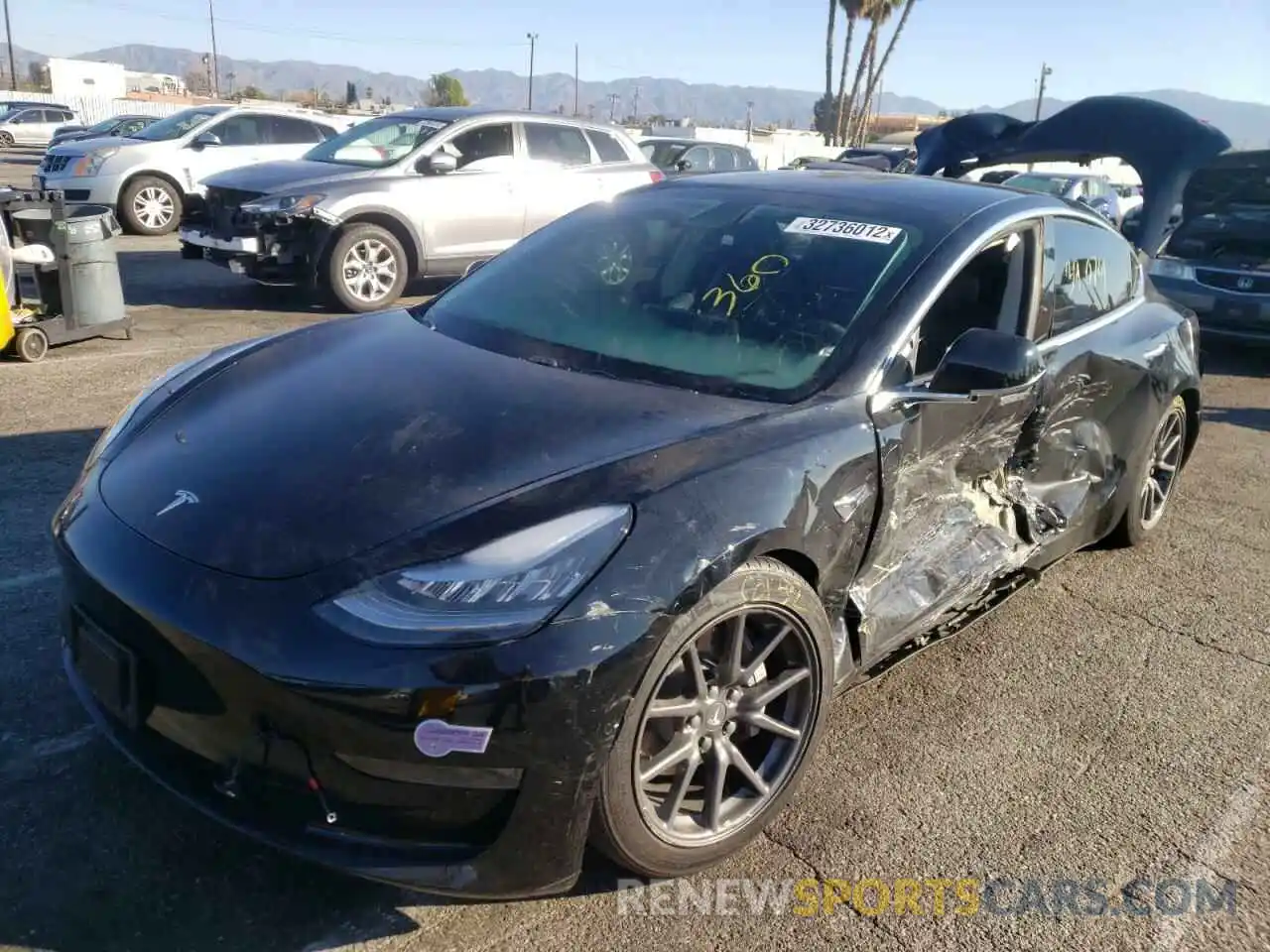 2 Photograph of a damaged car 5YJ3E1EA8KF410099 TESLA MODEL 3 2019