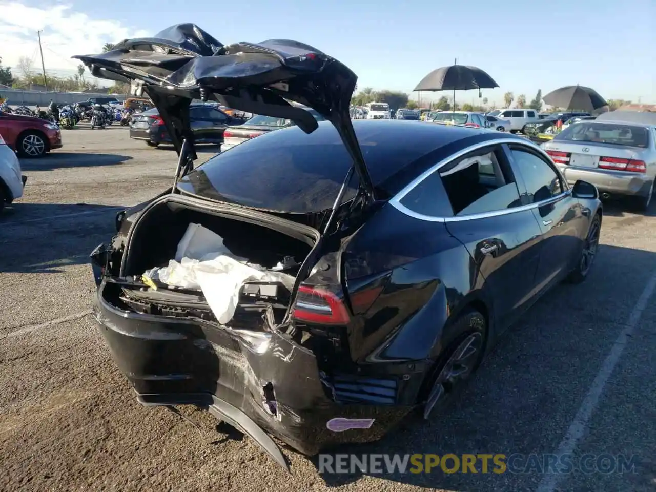 4 Photograph of a damaged car 5YJ3E1EA8KF410099 TESLA MODEL 3 2019