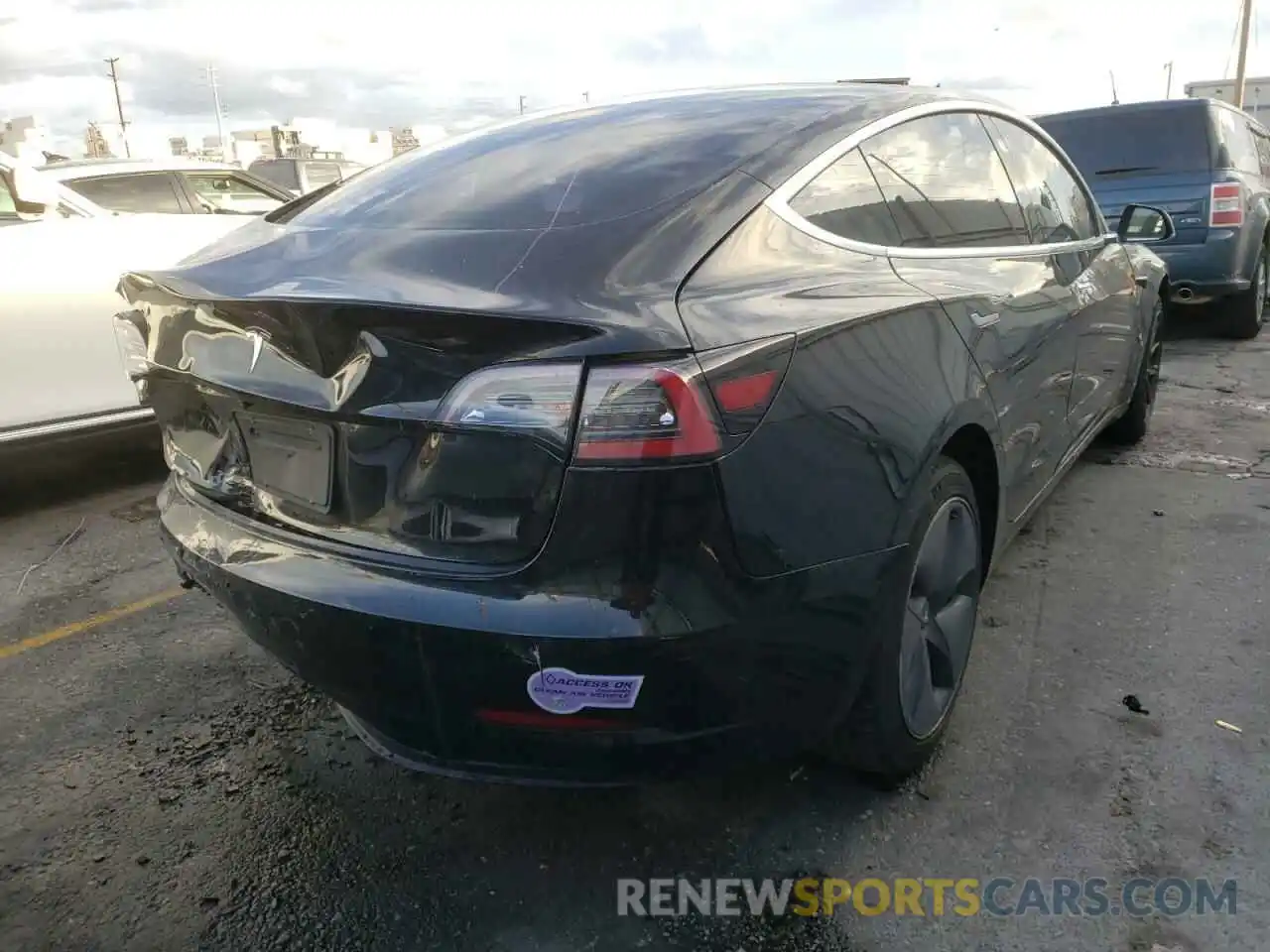 4 Photograph of a damaged car 5YJ3E1EA8KF410331 TESLA MODEL 3 2019