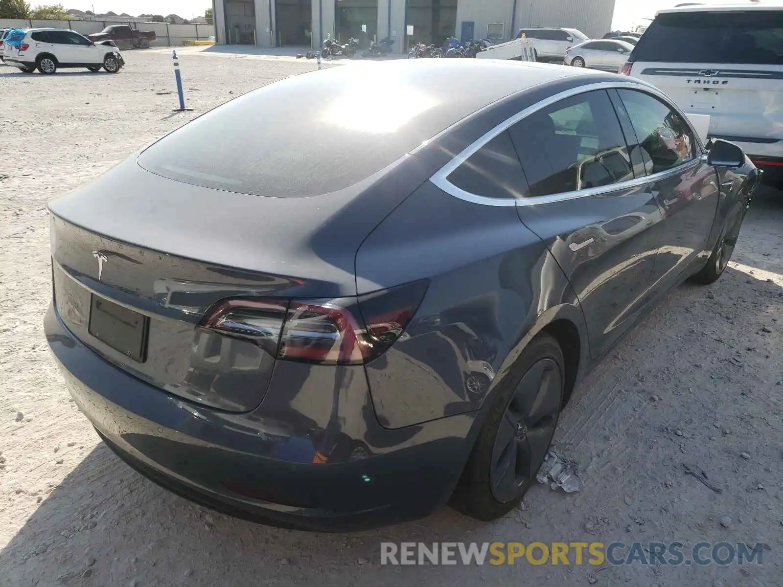 4 Photograph of a damaged car 5YJ3E1EA8KF411348 TESLA MODEL 3 2019