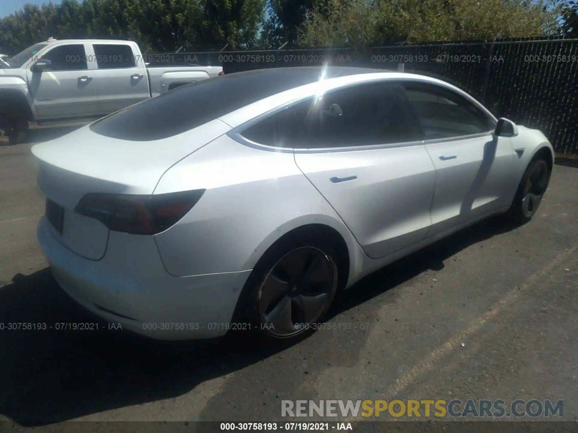 4 Photograph of a damaged car 5YJ3E1EA8KF412158 TESLA MODEL 3 2019