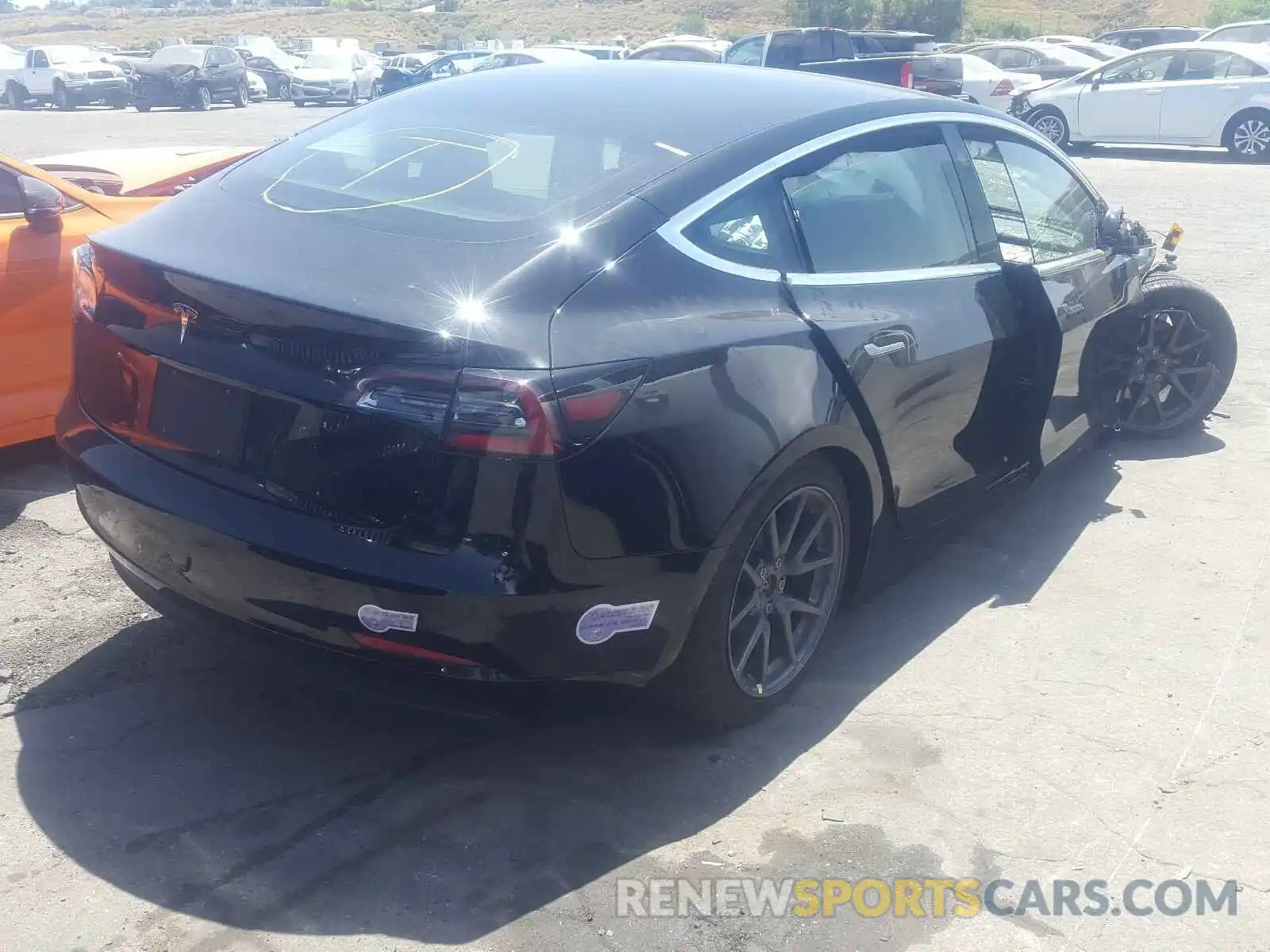 4 Photograph of a damaged car 5YJ3E1EA8KF421118 TESLA MODEL 3 2019