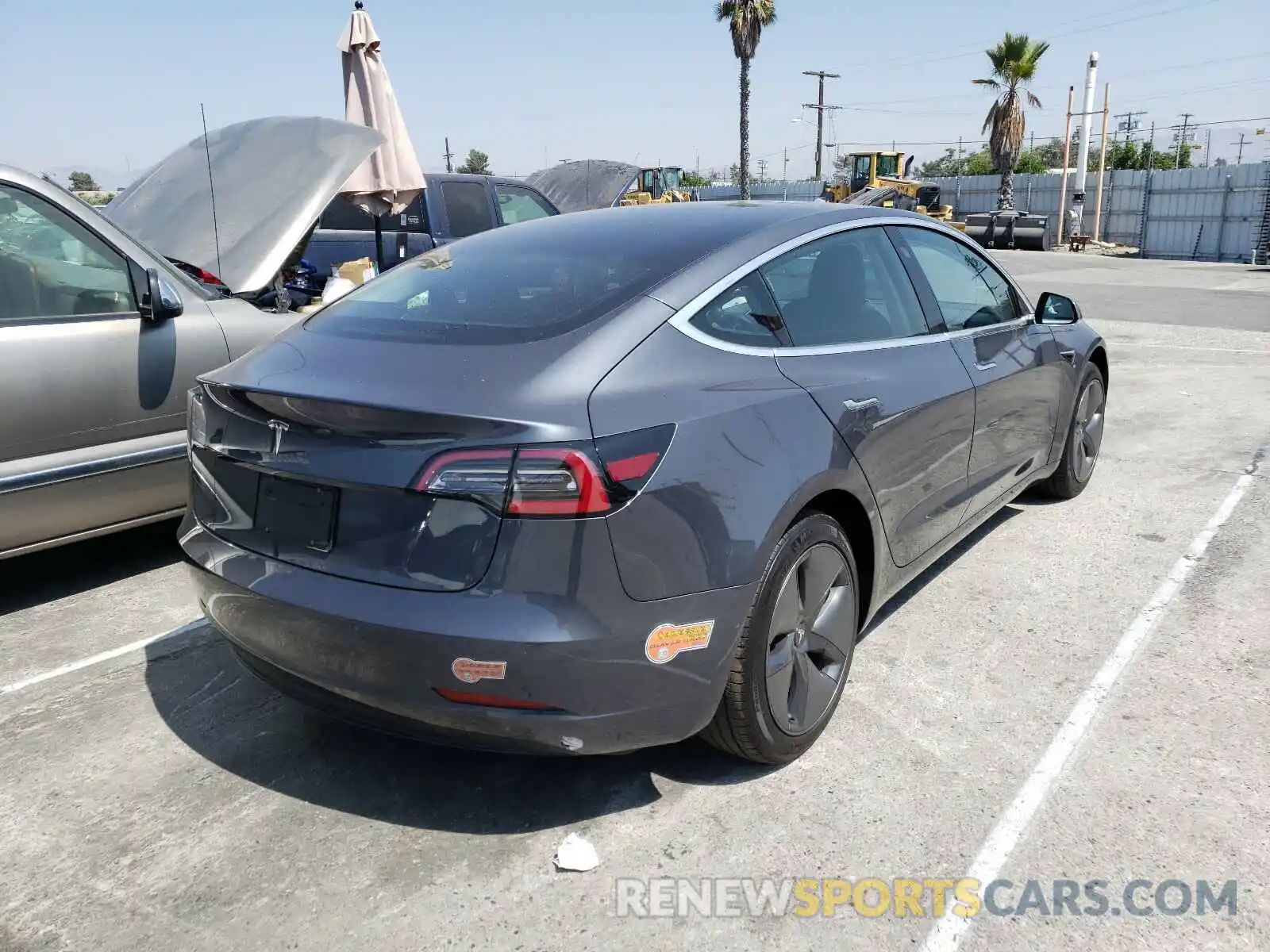 4 Photograph of a damaged car 5YJ3E1EA8KF447525 TESLA MODEL 3 2019