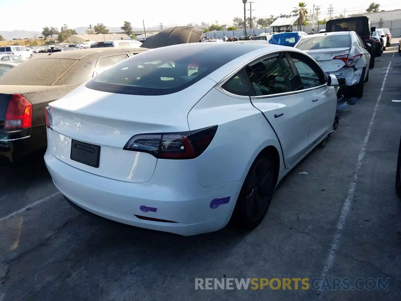 4 Photograph of a damaged car 5YJ3E1EA8KF484753 TESLA MODEL 3 2019