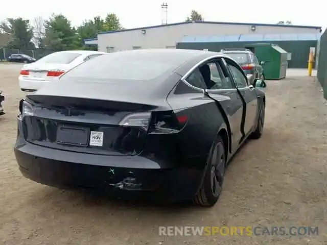 4 Photograph of a damaged car 5YJ3E1EA9KF192979 TESLA MODEL 3 2019