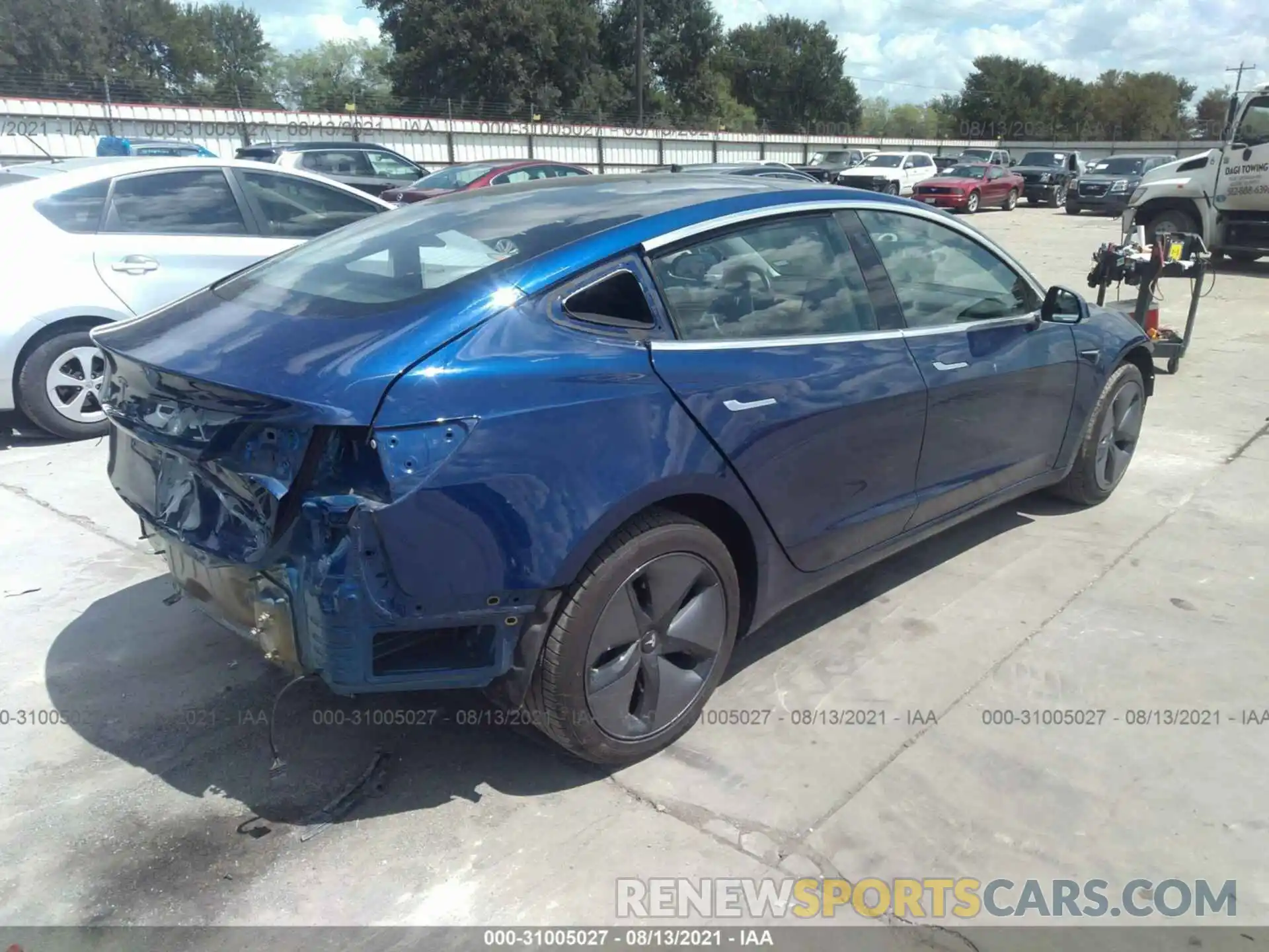 4 Photograph of a damaged car 5YJ3E1EA9KF193579 TESLA MODEL 3 2019