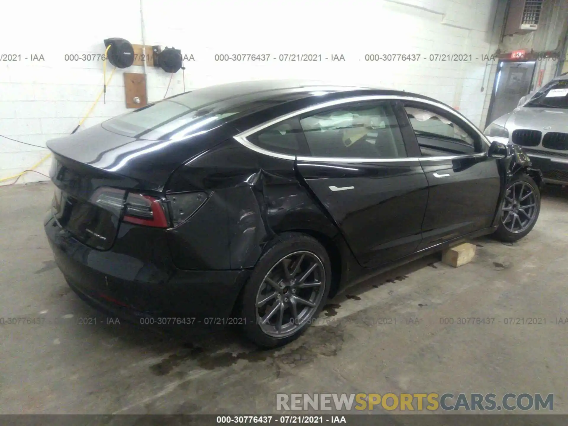 4 Photograph of a damaged car 5YJ3E1EA9KF297764 TESLA MODEL 3 2019