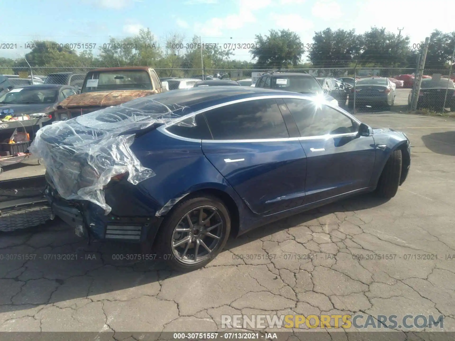 4 Photograph of a damaged car 5YJ3E1EA9KF299529 TESLA MODEL 3 2019