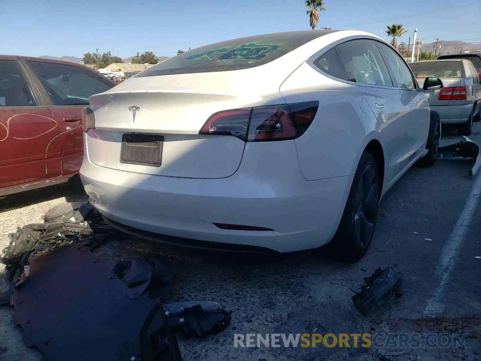 4 Photograph of a damaged car 5YJ3E1EA9KF299806 TESLA MODEL 3 2019