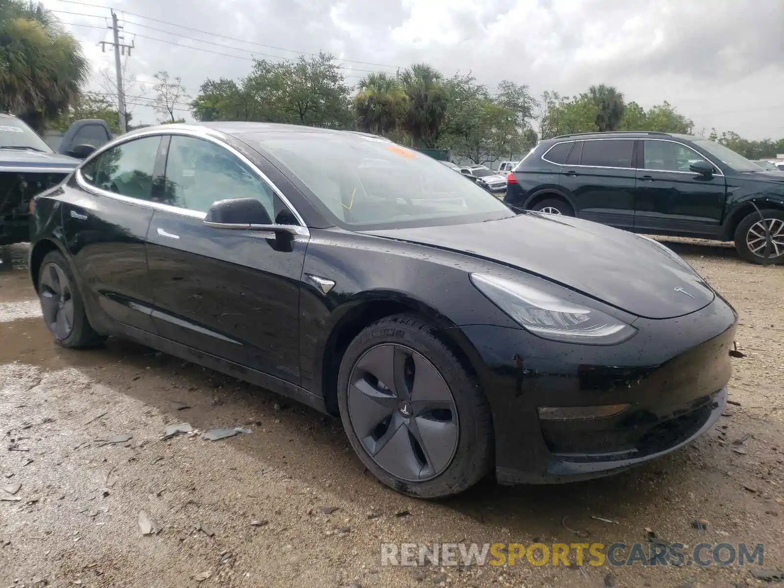 1 Photograph of a damaged car 5YJ3E1EA9KF323568 TESLA MODEL 3 2019