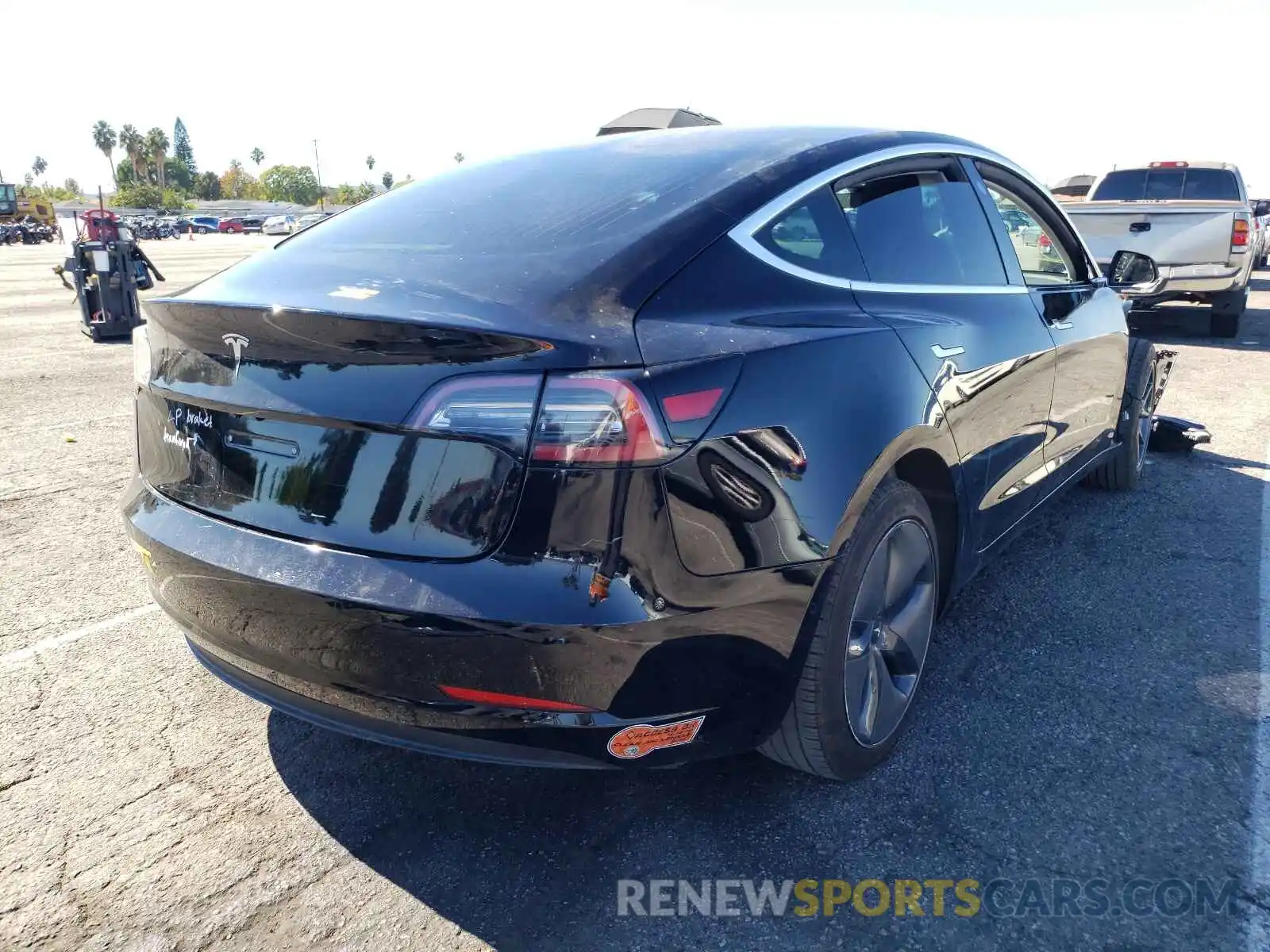 4 Photograph of a damaged car 5YJ3E1EA9KF399890 TESLA MODEL 3 2019