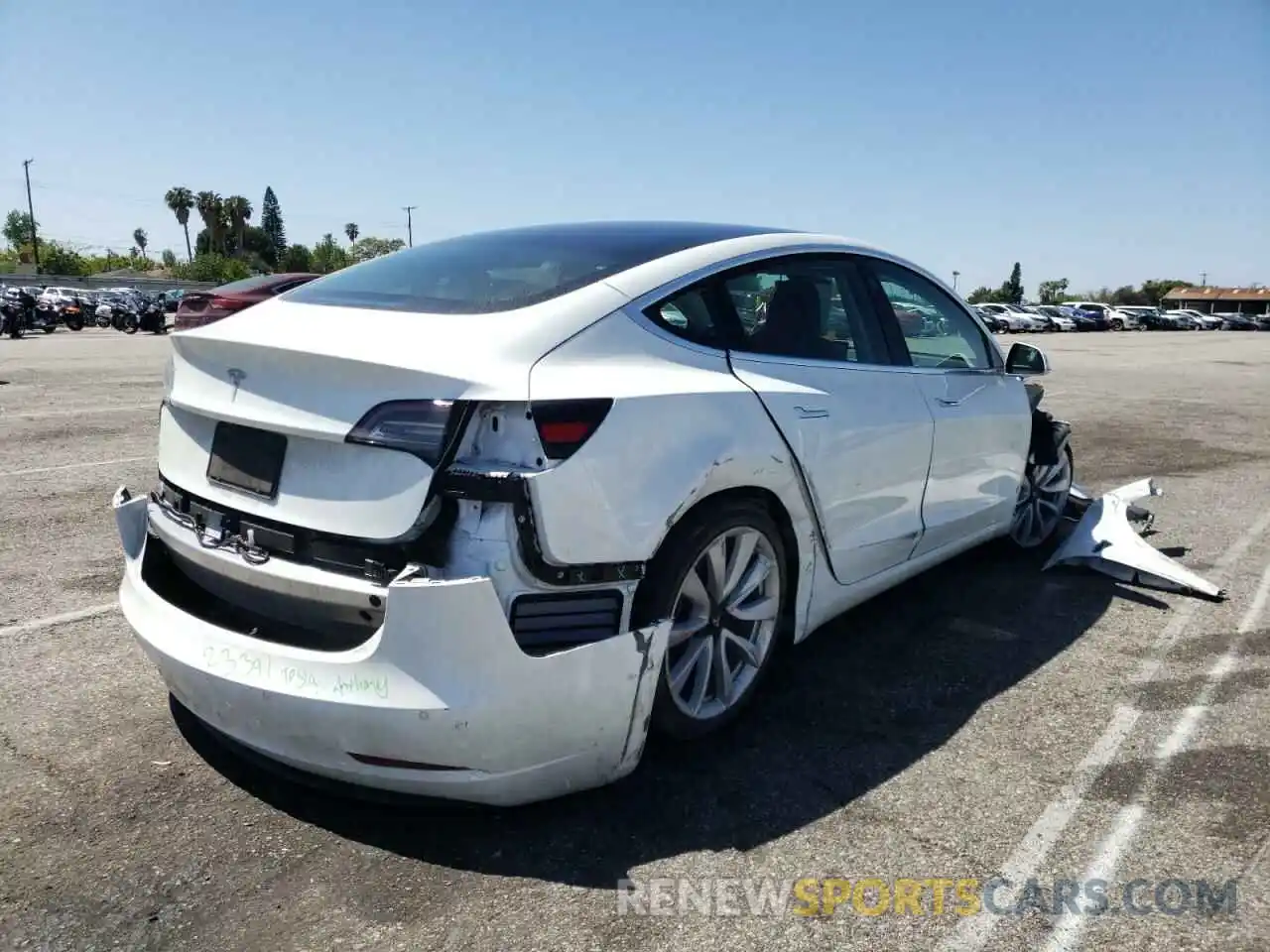 4 Photograph of a damaged car 5YJ3E1EA9KF472496 TESLA MODEL 3 2019