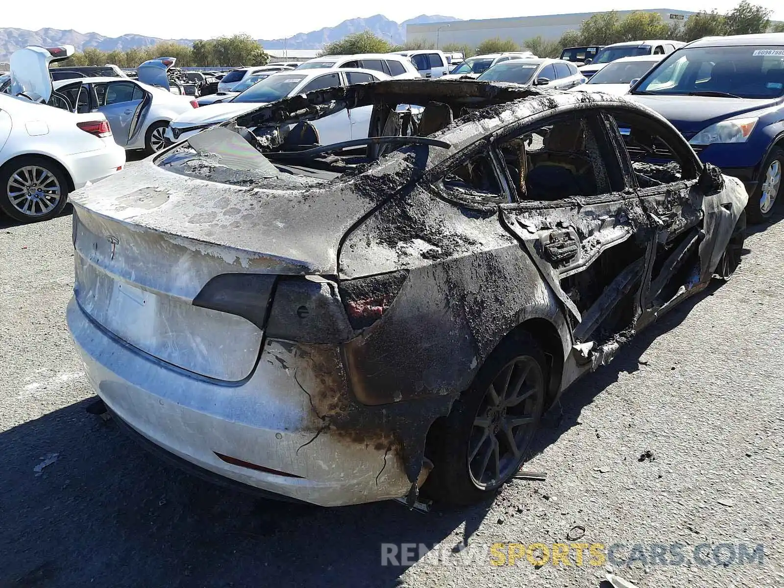 4 Photograph of a damaged car 5YJ3E1EAXKF299913 TESLA MODEL 3 2019