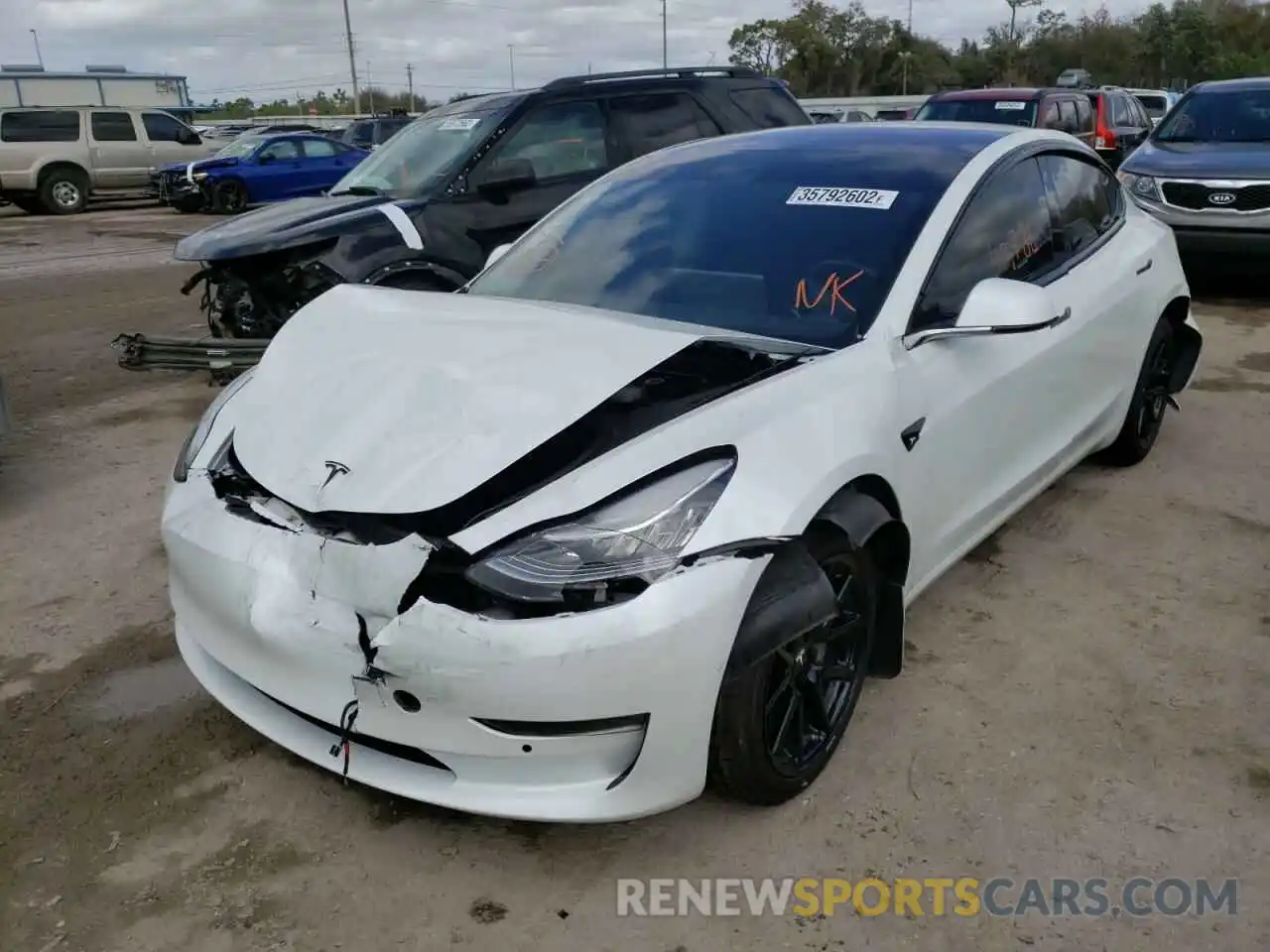 2 Photograph of a damaged car 5YJ3E1EAXKF309761 TESLA MODEL 3 2019