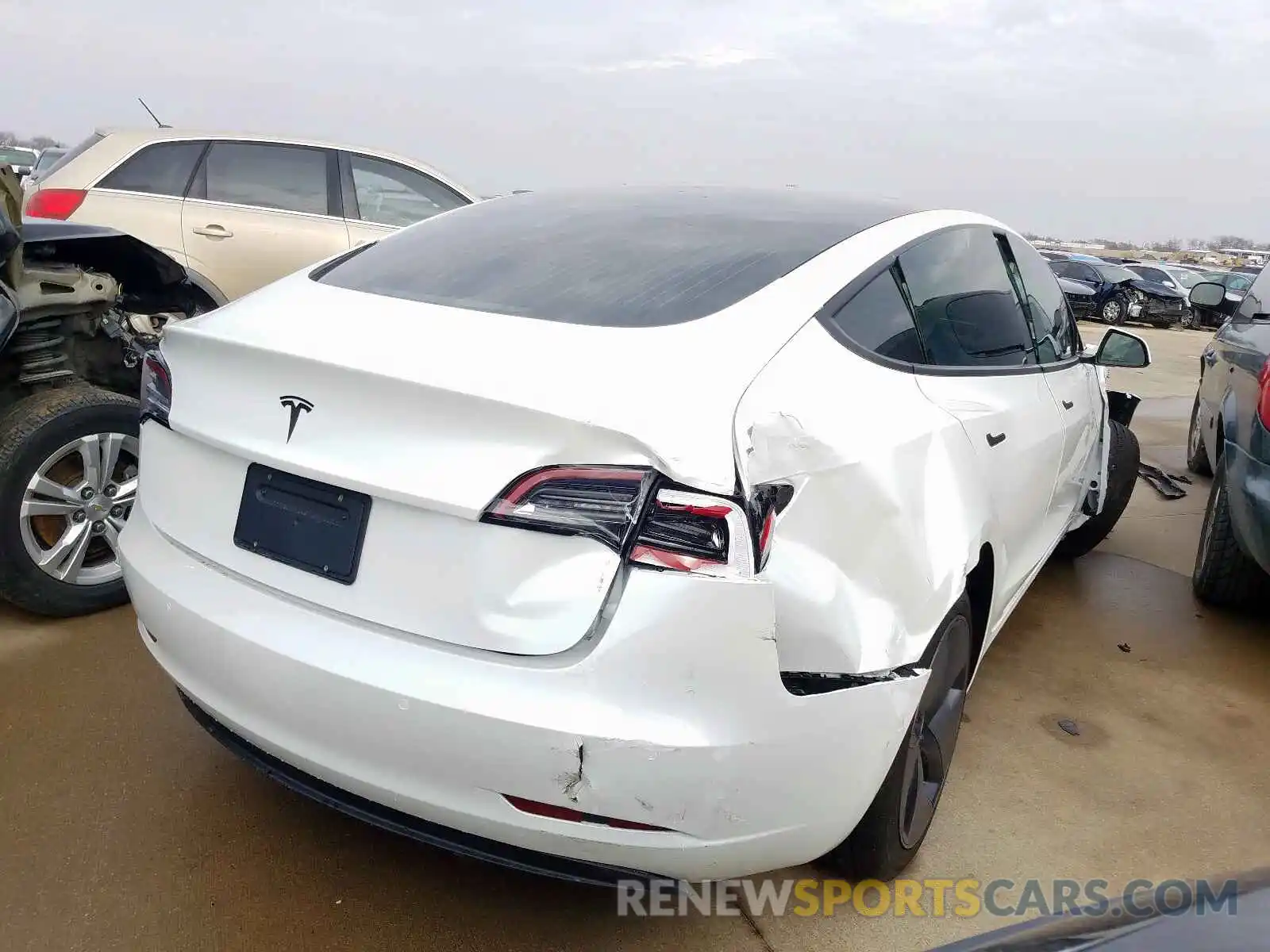 4 Photograph of a damaged car 5YJ3E1EAXKF309856 TESLA MODEL 3 2019