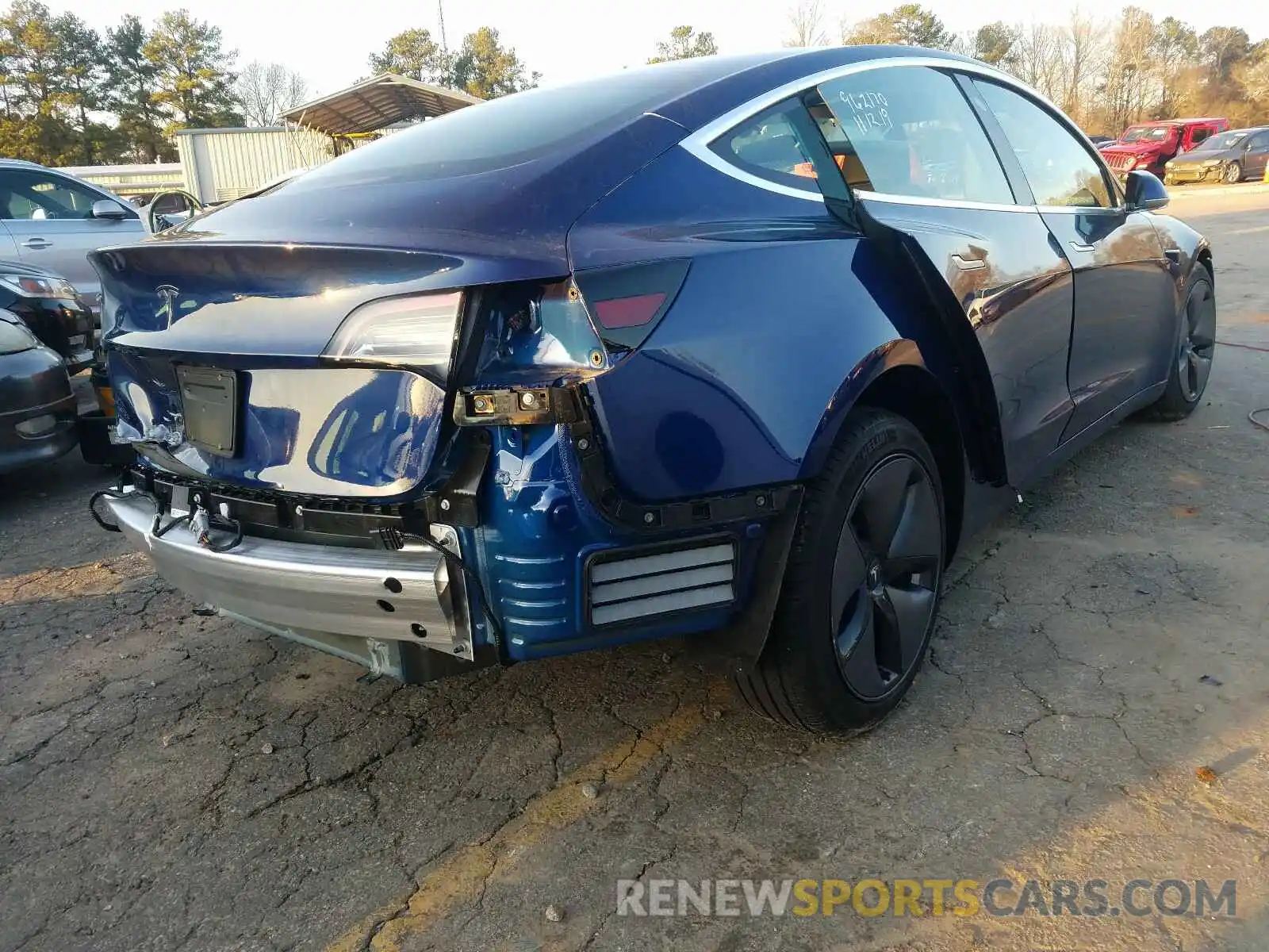 4 Photograph of a damaged car 5YJ3E1EAXKF326219 TESLA MODEL 3 2019