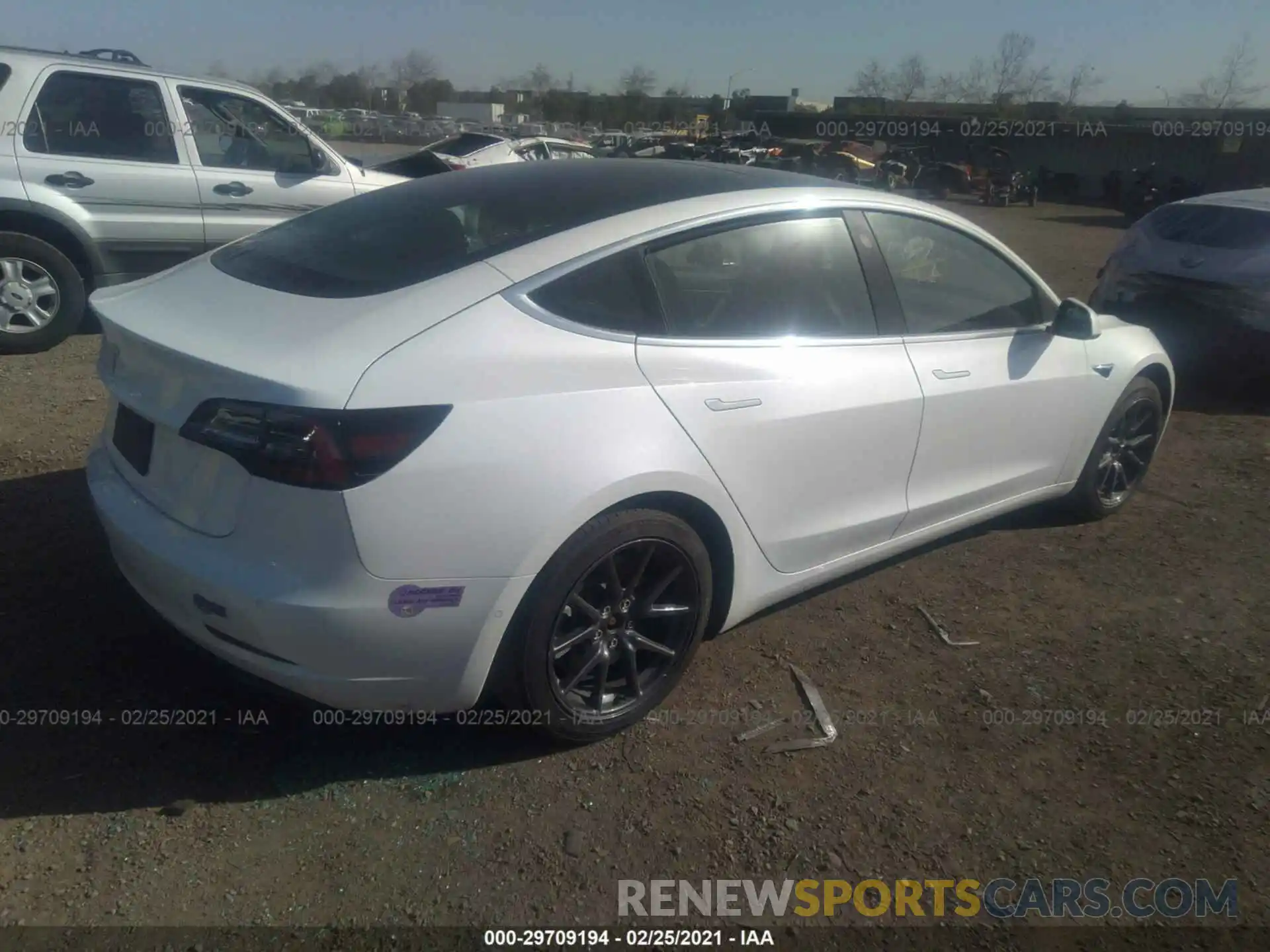 4 Photograph of a damaged car 5YJ3E1EAXKF401744 TESLA MODEL 3 2019