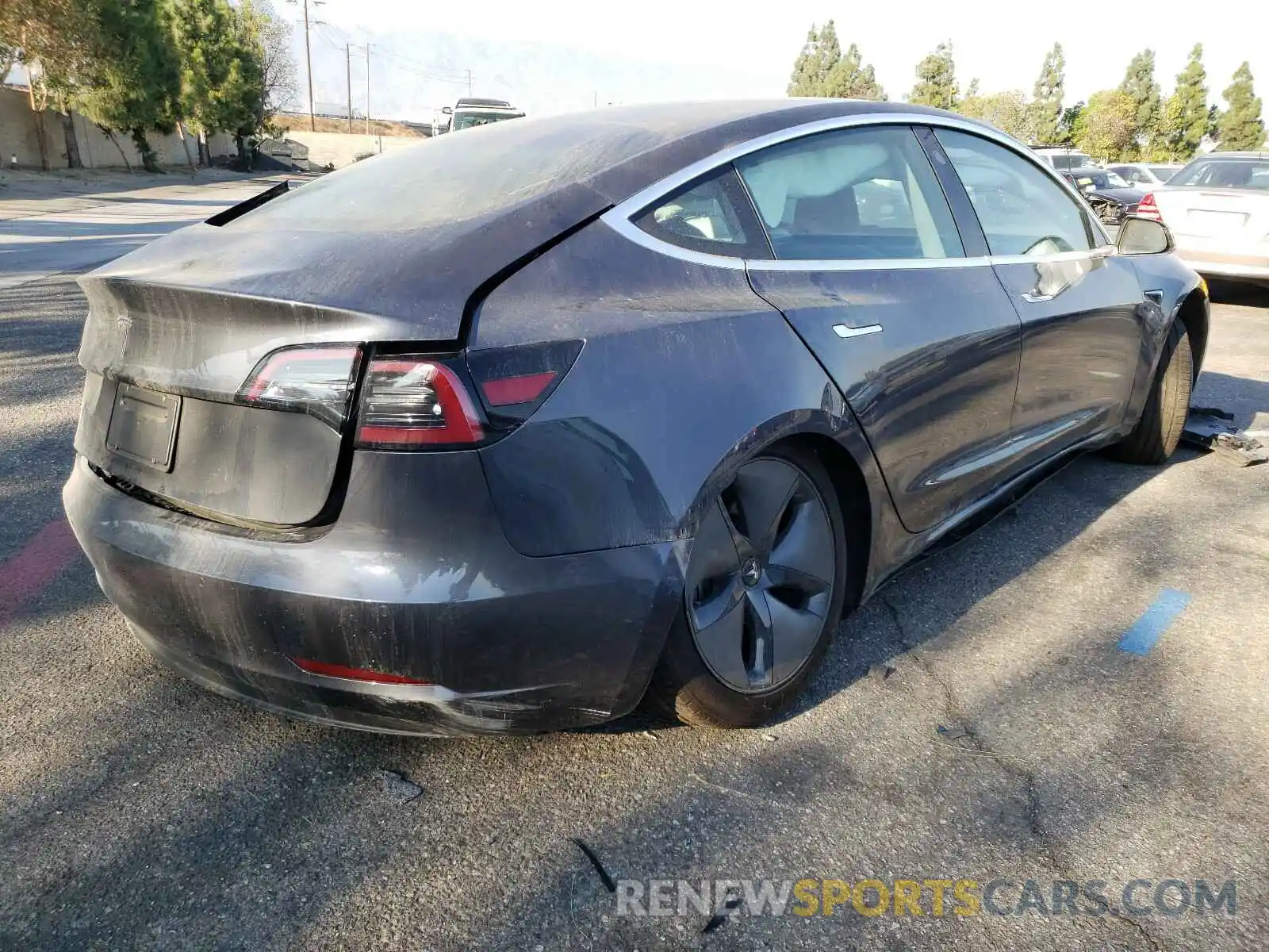 4 Photograph of a damaged car 5YJ3E1EAXKF447445 TESLA MODEL 3 2019