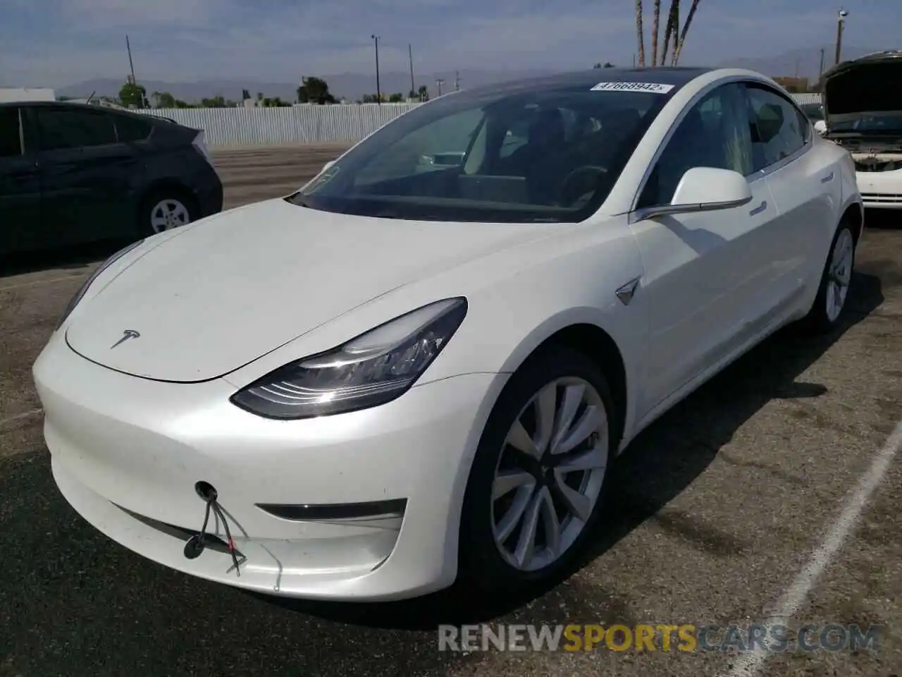 2 Photograph of a damaged car 5YJ3E1EAXKF472605 TESLA MODEL 3 2019