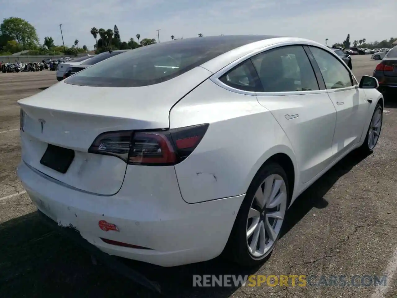 4 Photograph of a damaged car 5YJ3E1EAXKF472605 TESLA MODEL 3 2019