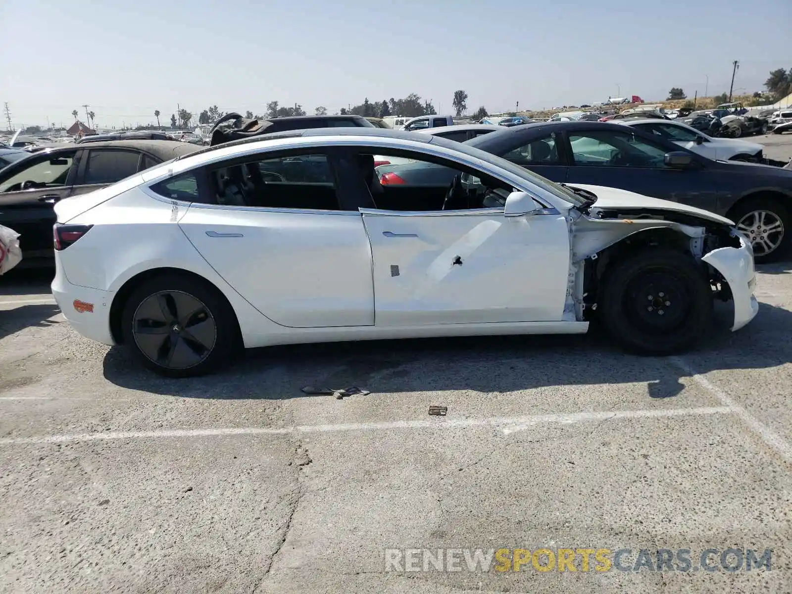 9 Photograph of a damaged car 5YJ3E1EAXKF485208 TESLA MODEL 3 2019