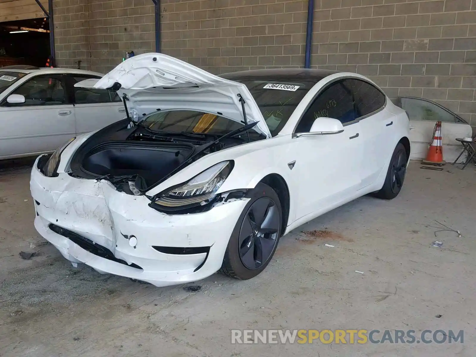 2 Photograph of a damaged car 5YJ3E1EB0KF193799 TESLA MODEL 3 2019