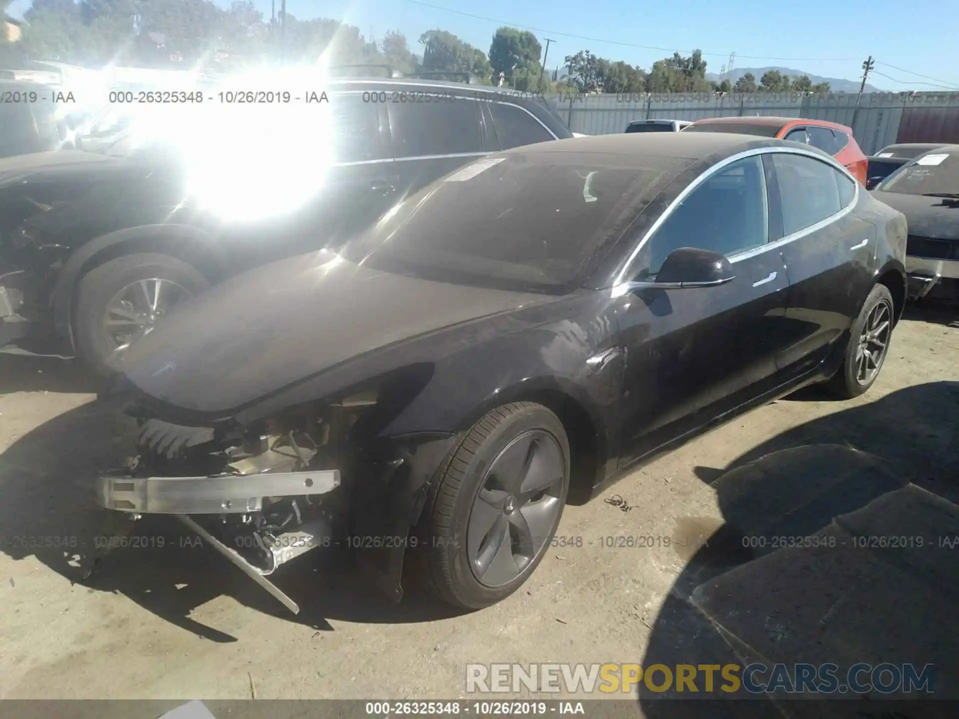 2 Photograph of a damaged car 5YJ3E1EB0KF198999 TESLA MODEL 3 2019