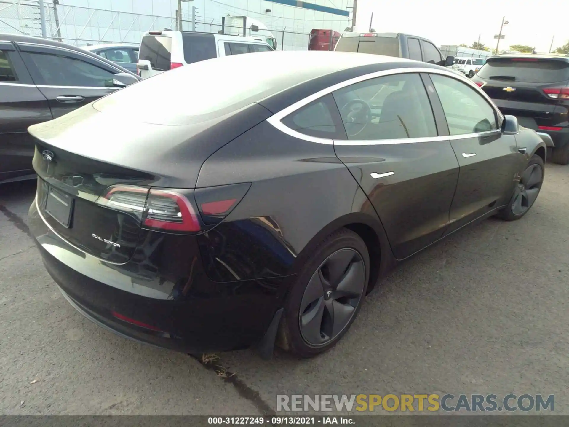 4 Photograph of a damaged car 5YJ3E1EB0KF384574 TESLA MODEL 3 2019