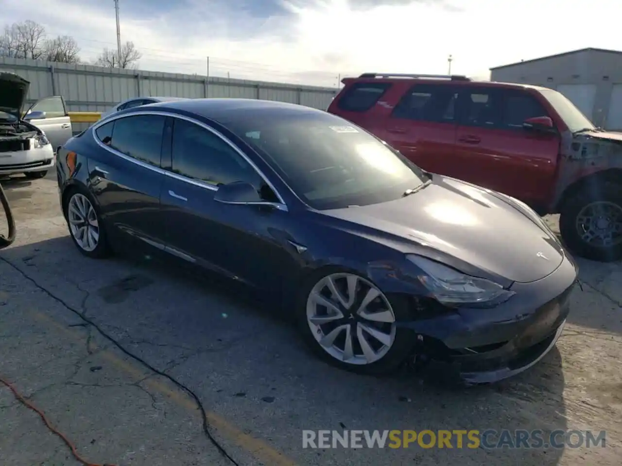 4 Photograph of a damaged car 5YJ3E1EB0KF389550 TESLA MODEL 3 2019