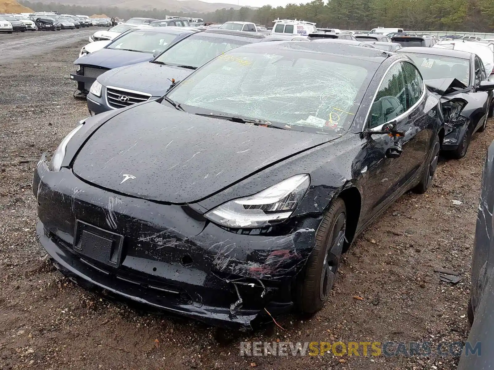 2 Photograph of a damaged car 5YJ3E1EB0KF418075 TESLA MODEL 3 2019