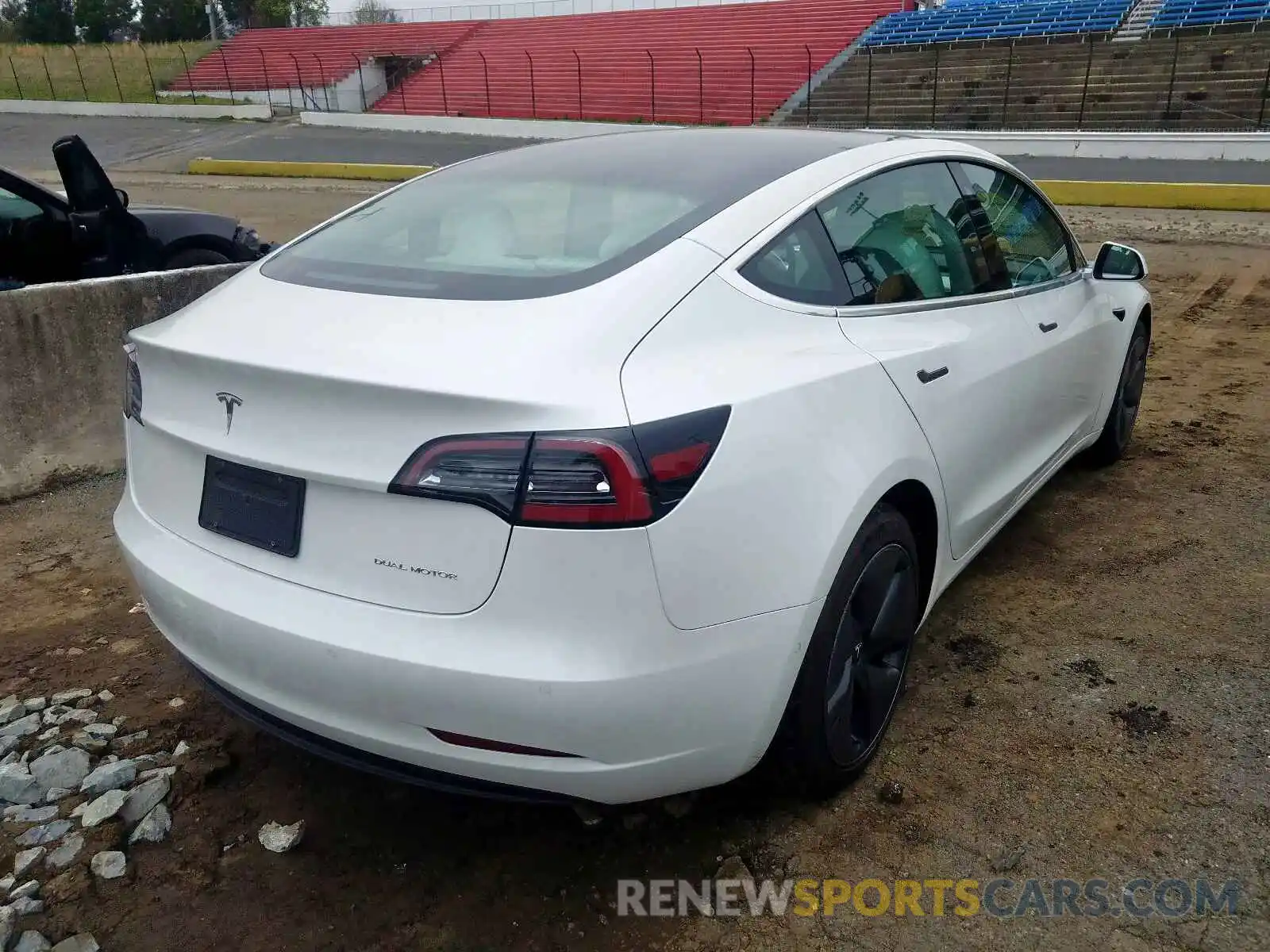 4 Photograph of a damaged car 5YJ3E1EB0KF513011 TESLA MODEL 3 2019