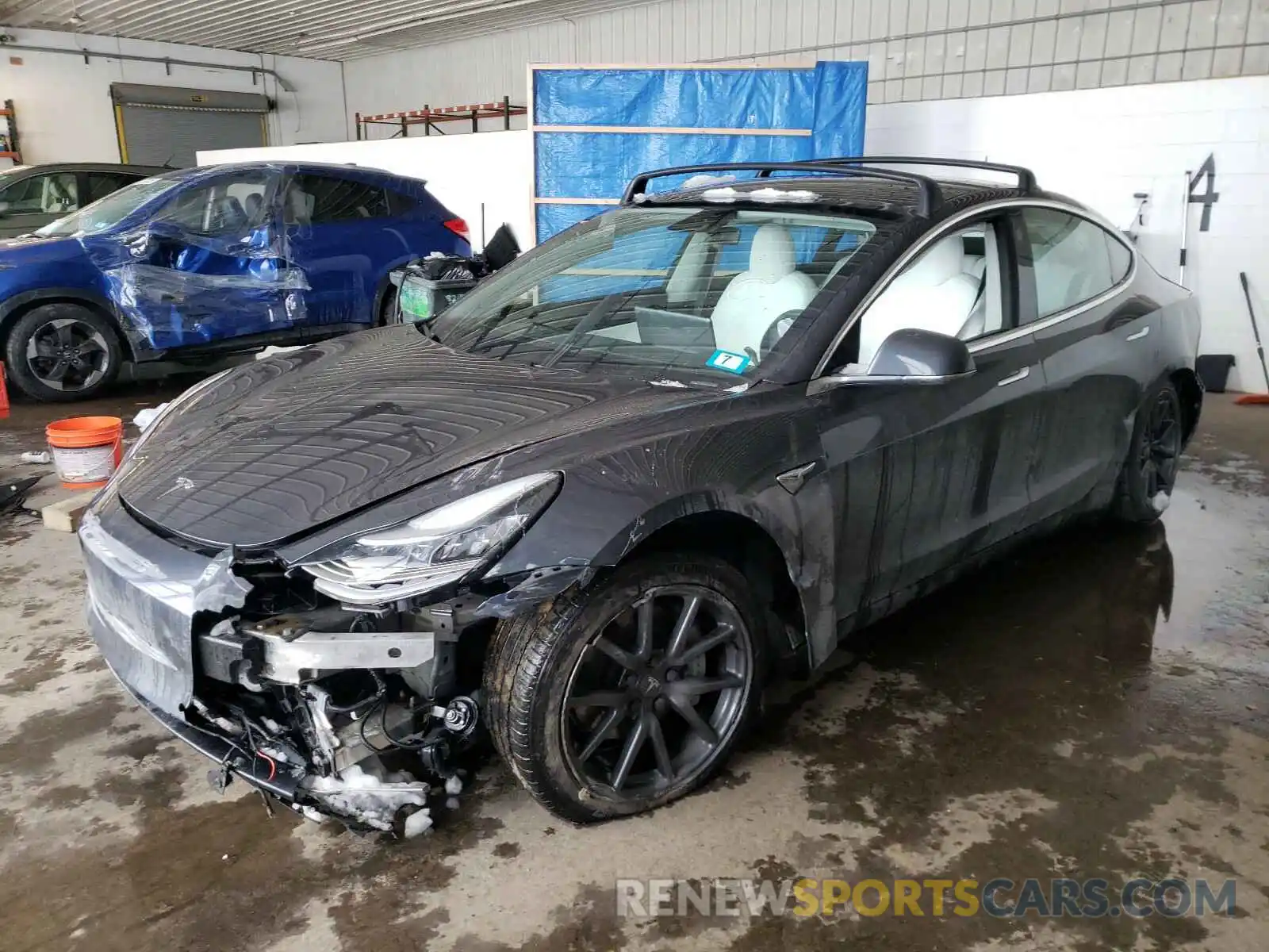 2 Photograph of a damaged car 5YJ3E1EB1KF390948 TESLA MODEL 3 2019