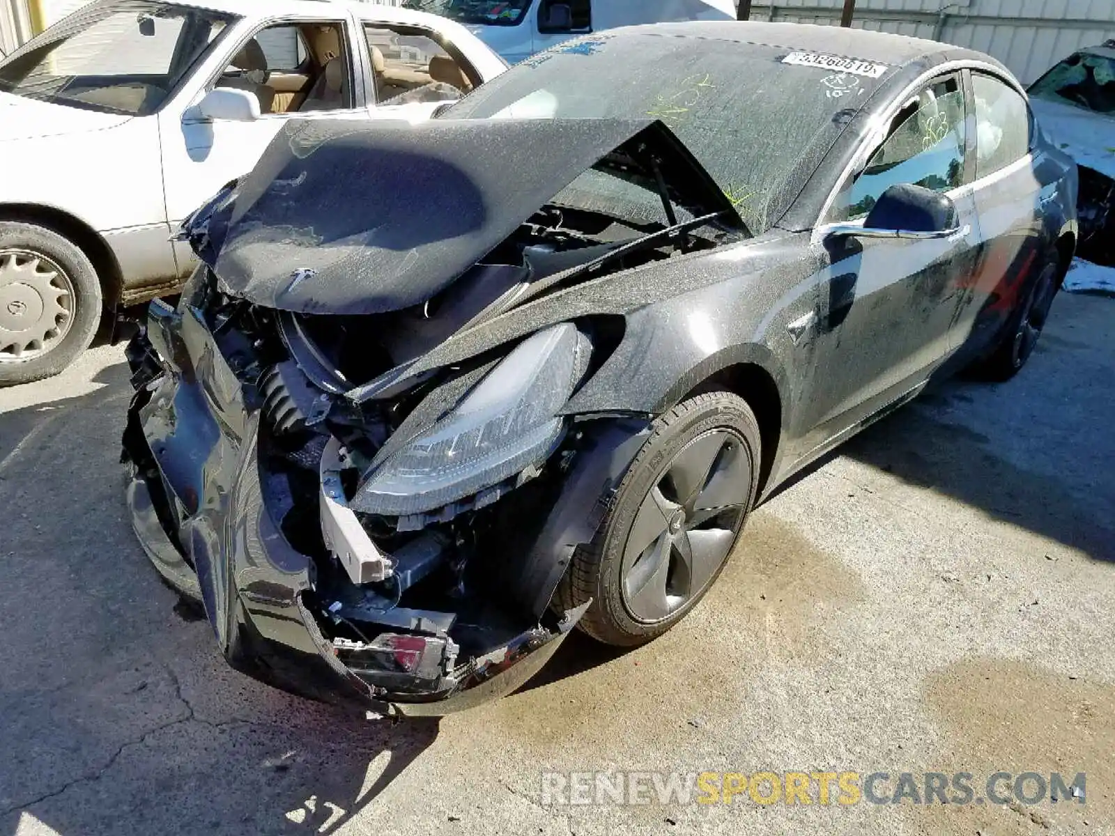 2 Photograph of a damaged car 5YJ3E1EB1KF451375 TESLA MODEL 3 2019