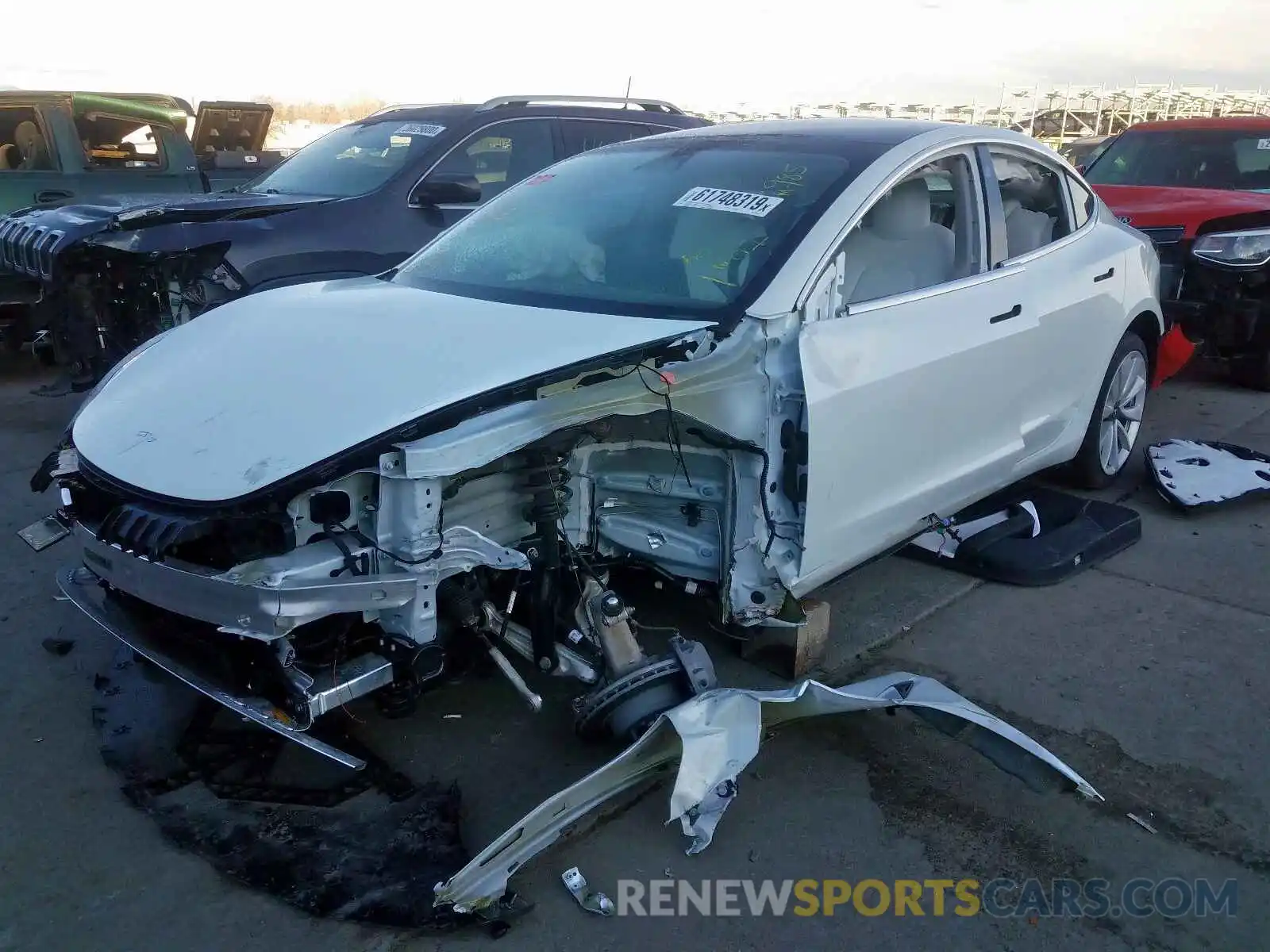 2 Photograph of a damaged car 5YJ3E1EB1KF454728 TESLA MODEL 3 2019