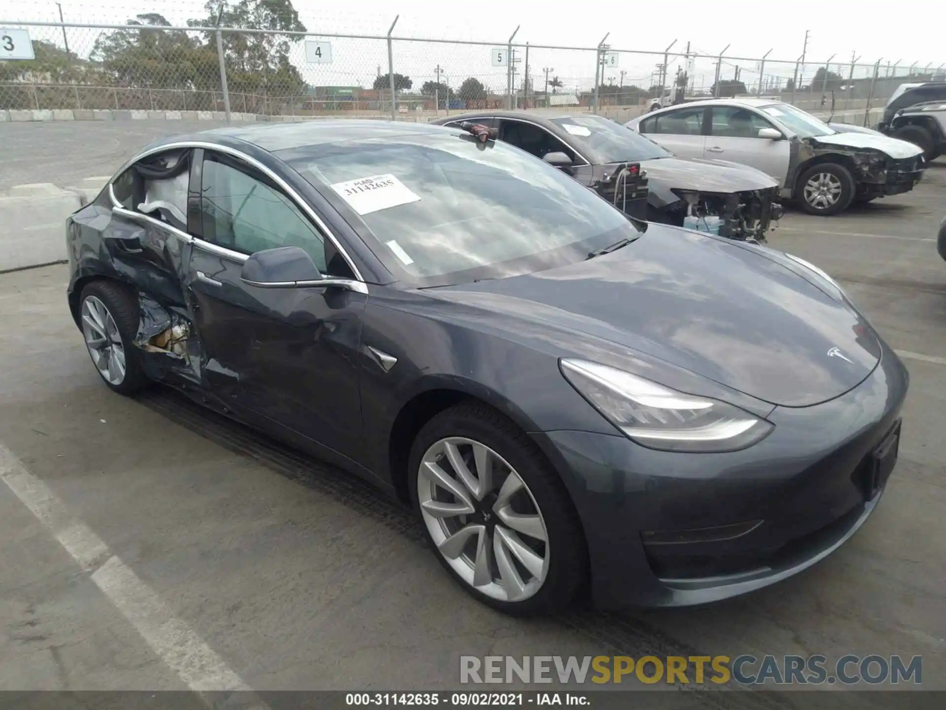 1 Photograph of a damaged car 5YJ3E1EB1KF529928 TESLA MODEL 3 2019